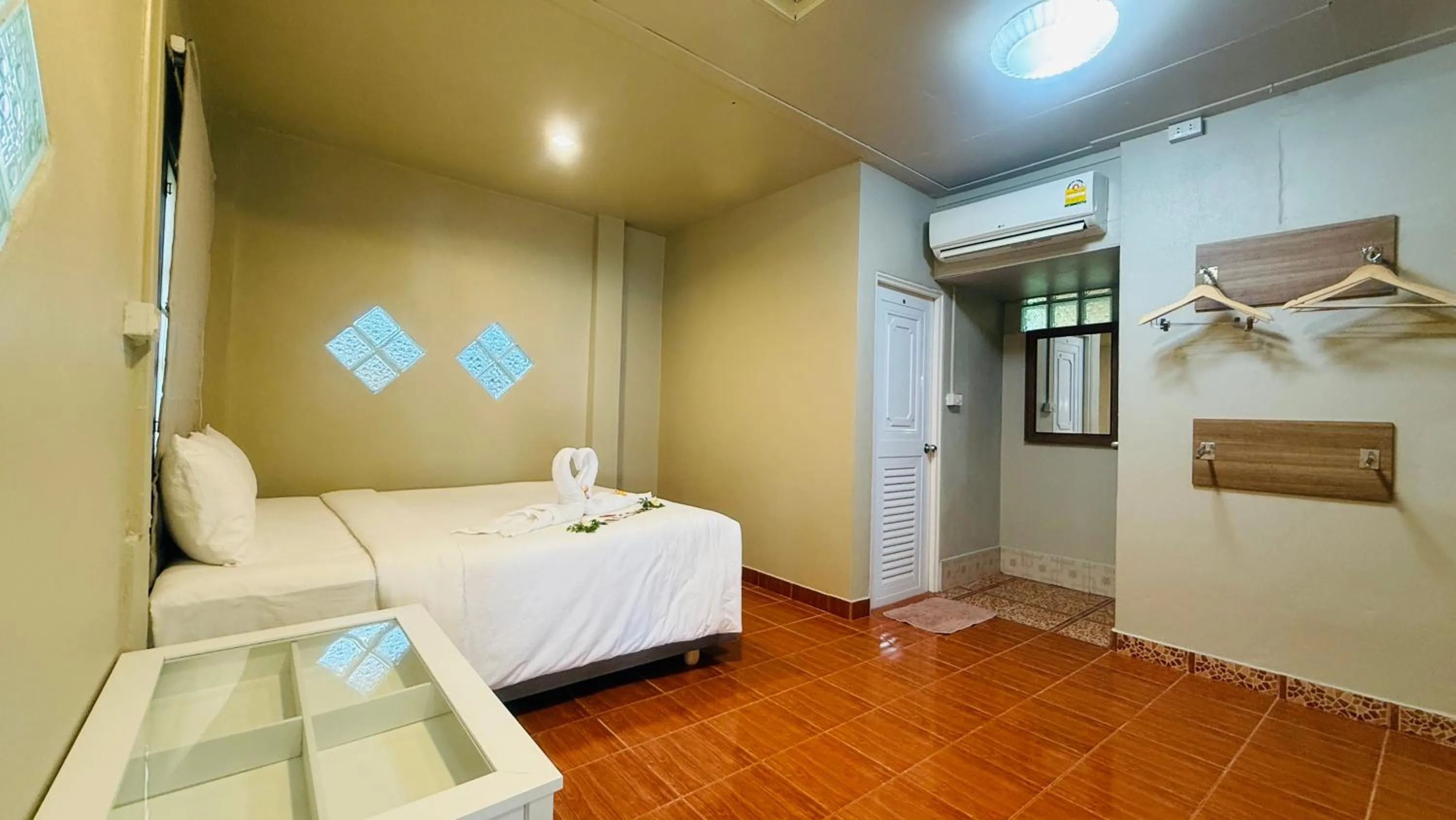 Bed in Amity Beach Resort