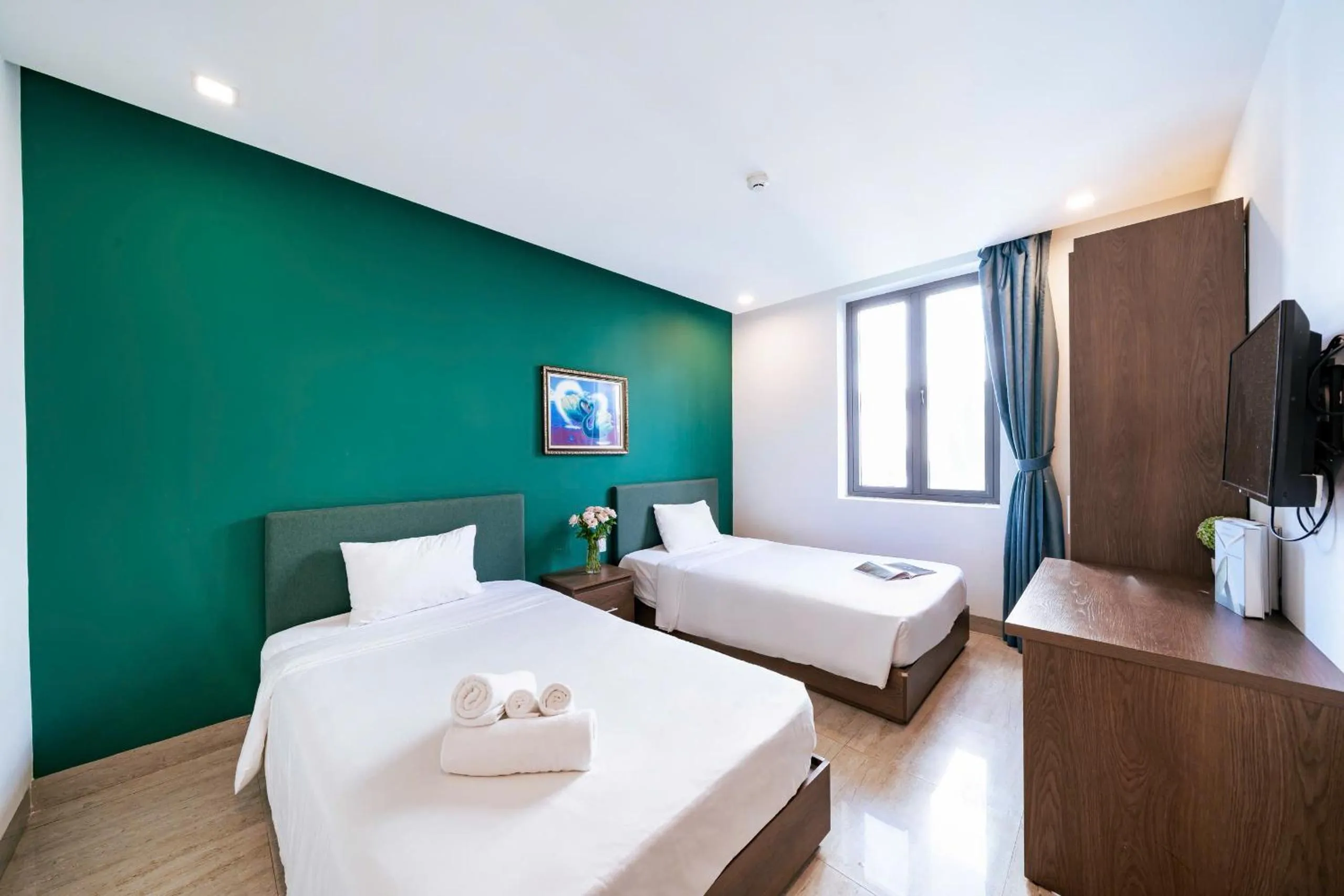 TV and multimedia, Bed in Ocean Garden Boutique Da Nang by Haviland