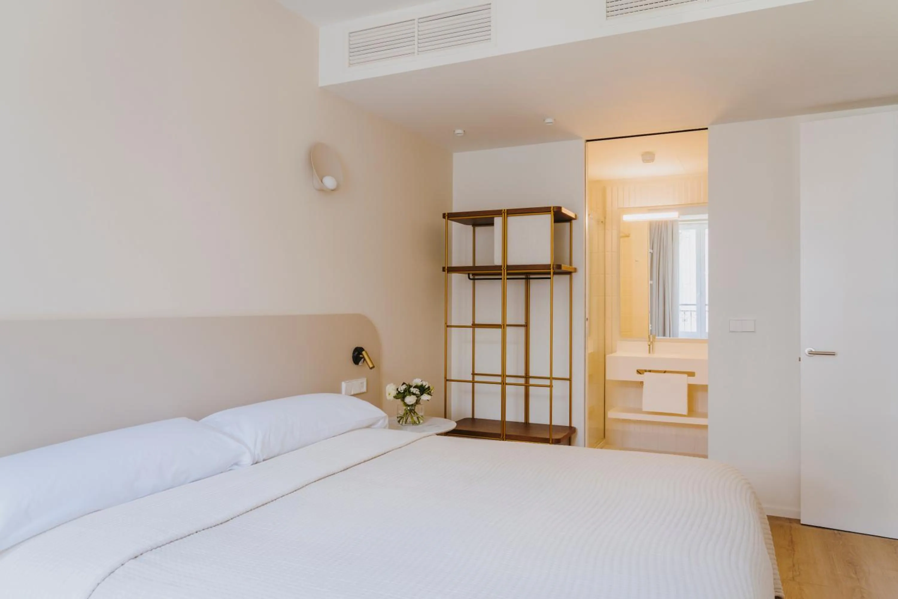 Bed in The Passage Apartments