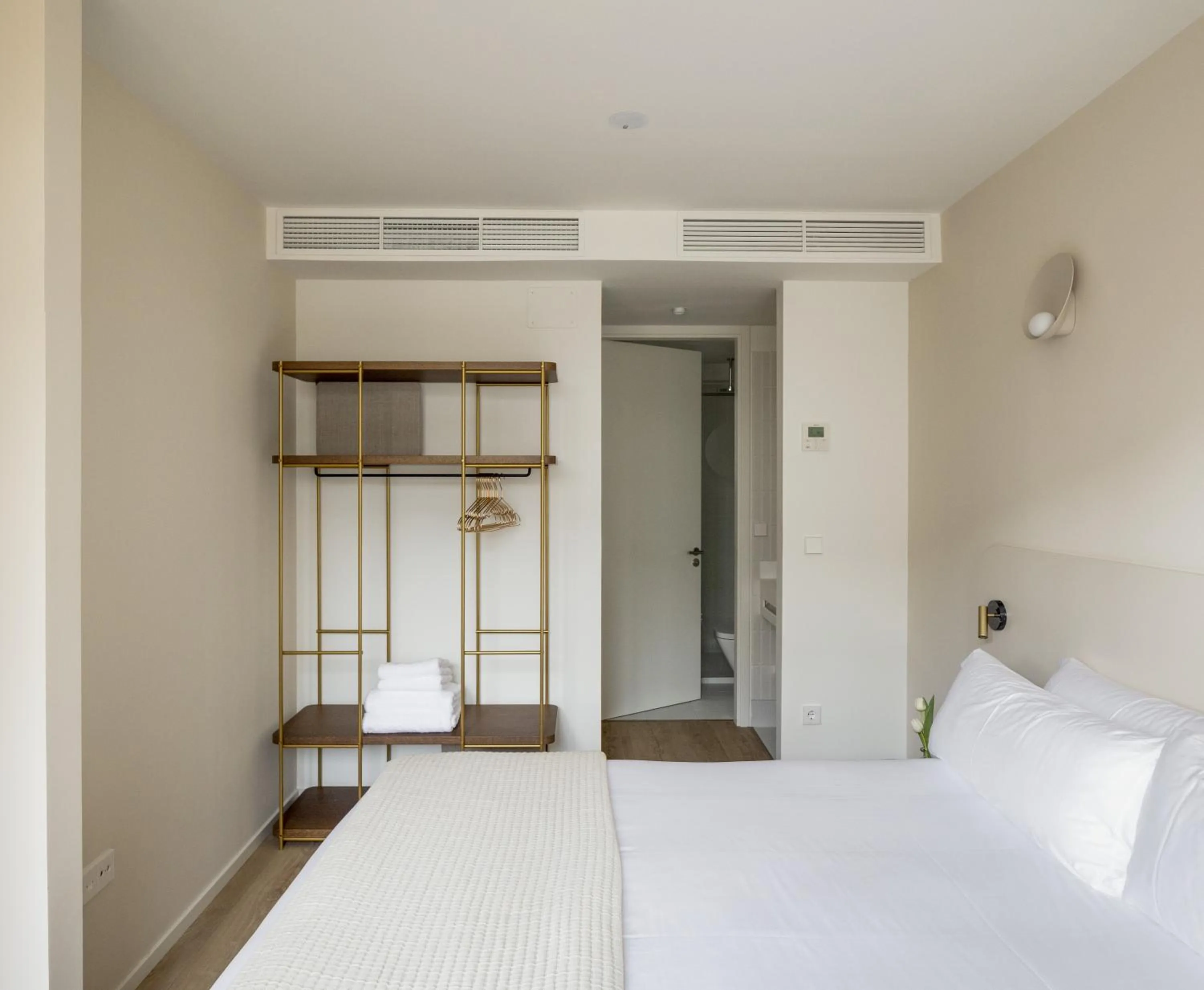 Bed in The Passage Apartments