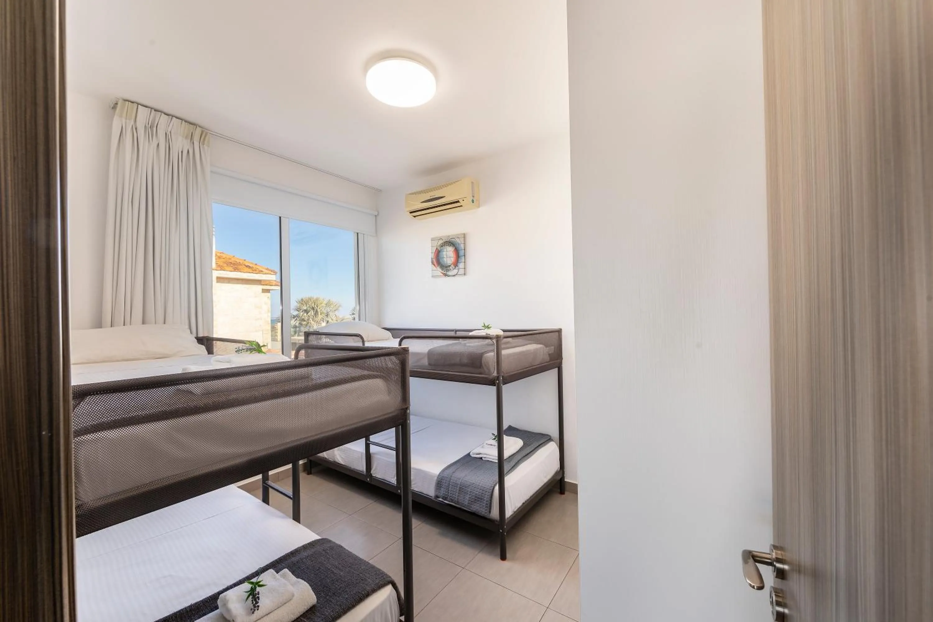 Bed in Ayia Thekla Seafront Villa Dagi