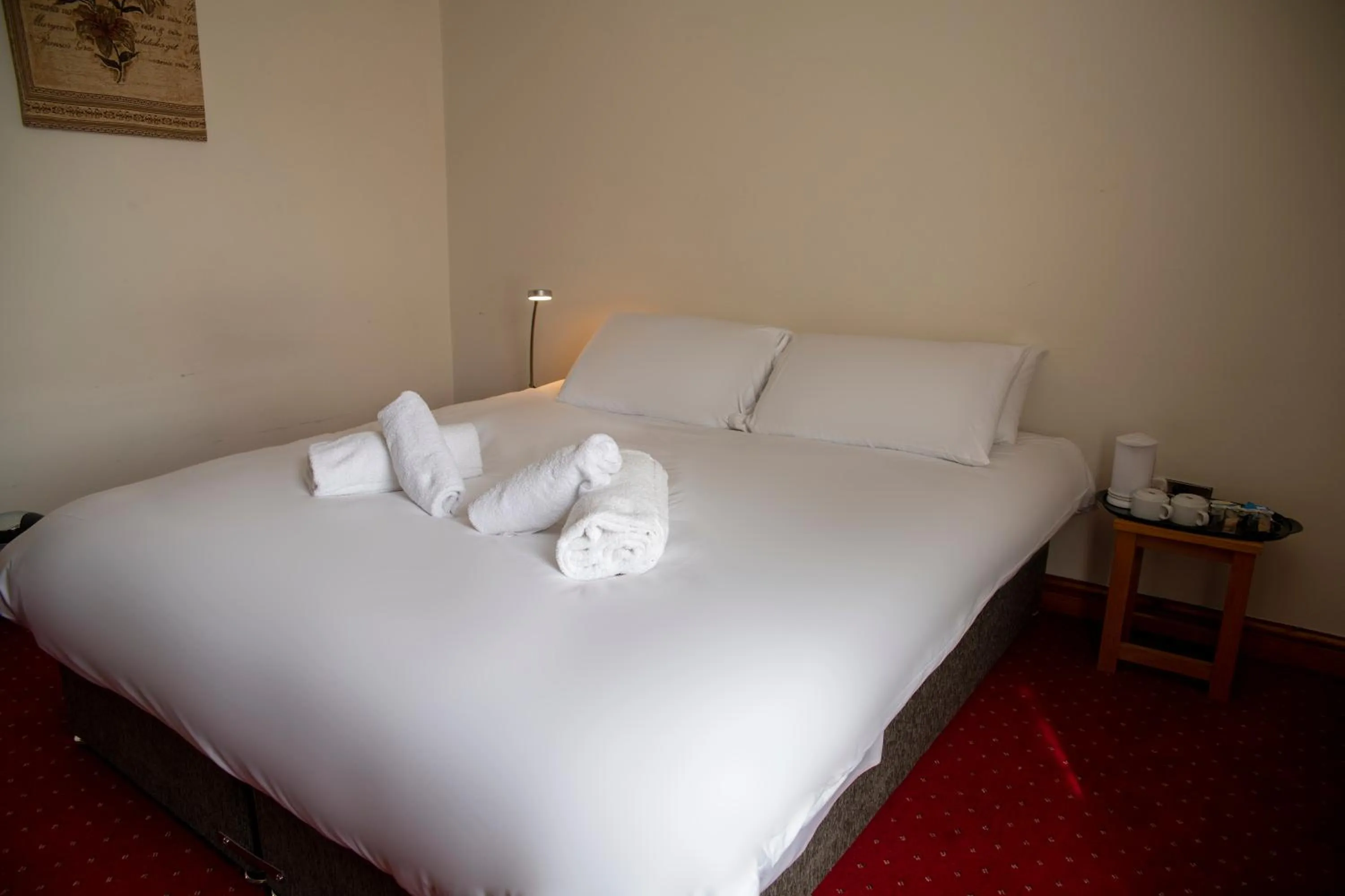 Bed in The Knighton Apartment