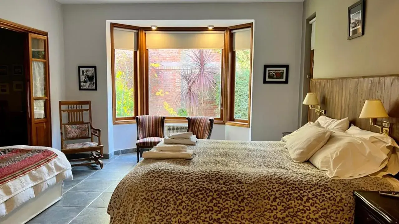 Quadruple Room with Garden View in Hosteria Casa de Paula Quadruple Room with Garden View in Hosteria Casa de Paula