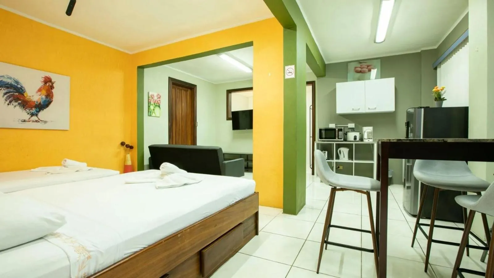 Bed in Coati Arenal Lodge