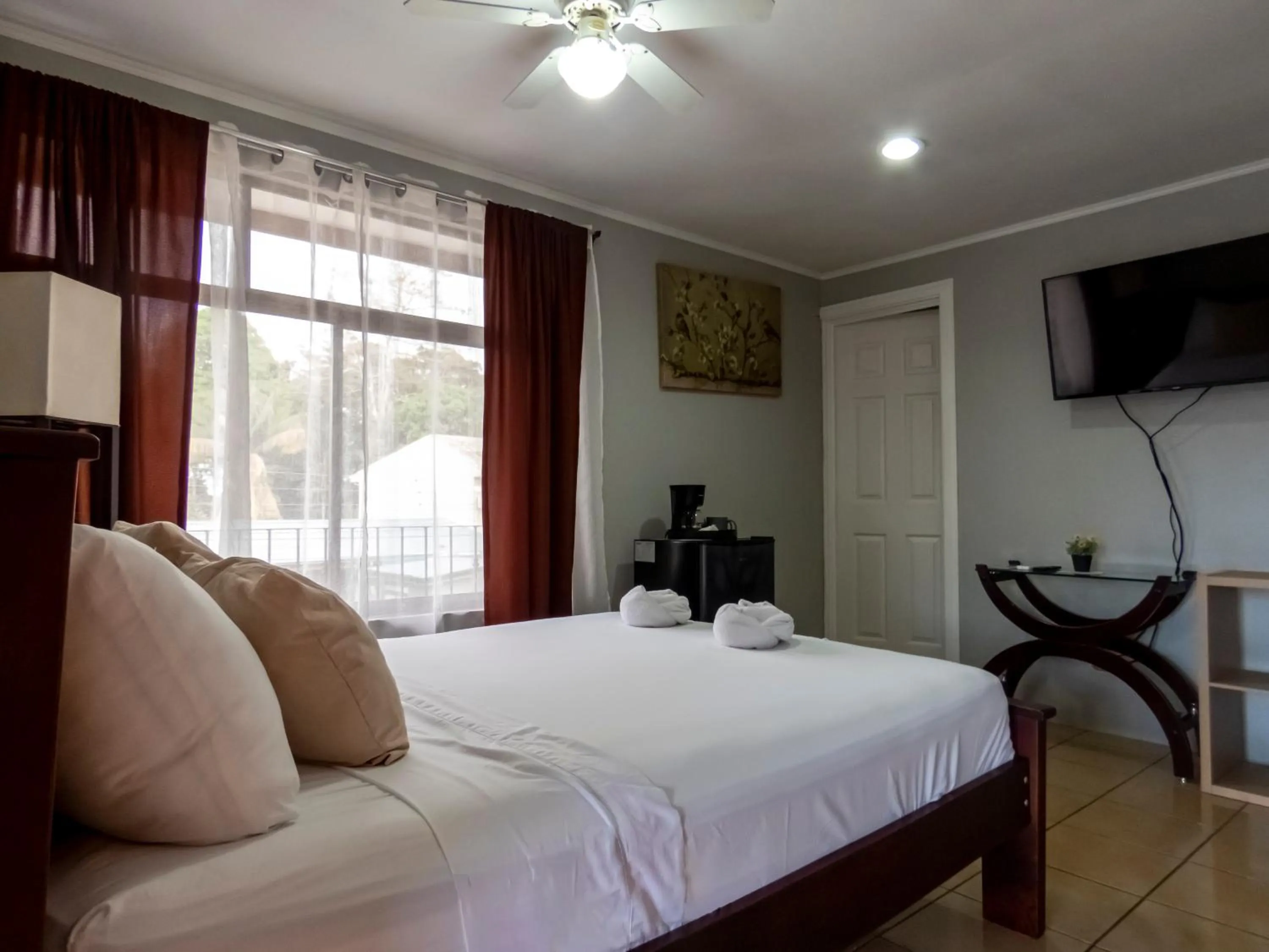 Bed in Coati Arenal Lodge