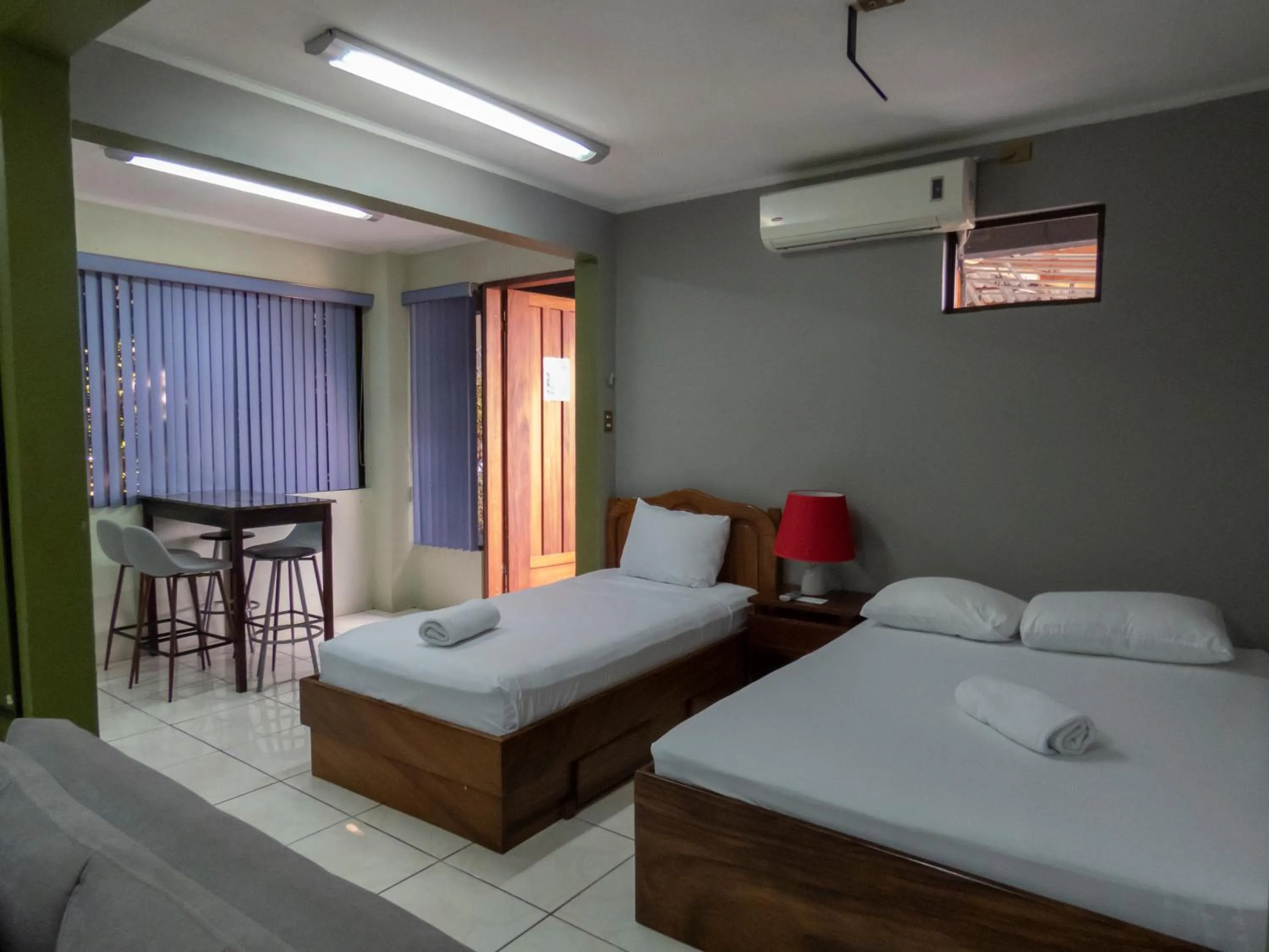 Bed in Coati Arenal Lodge