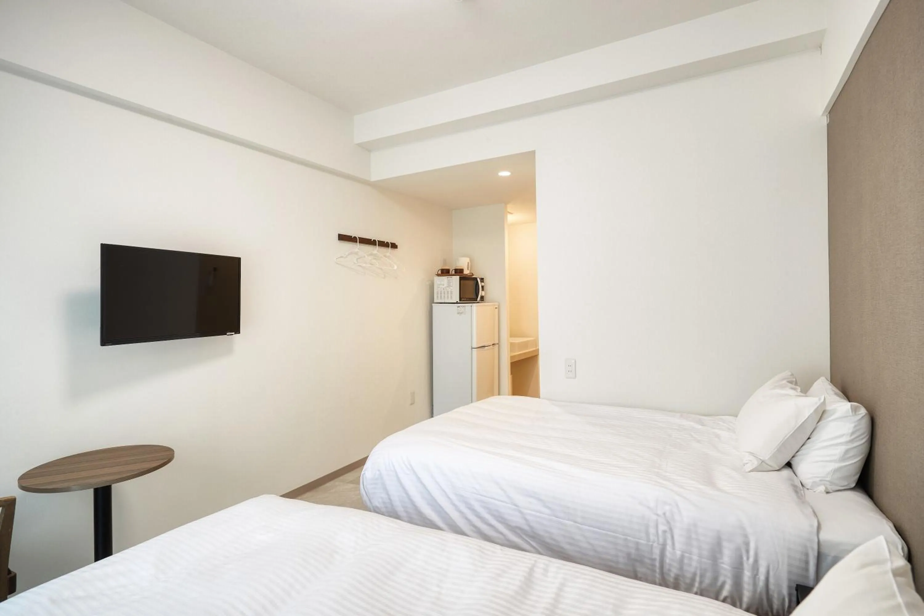 Bed in BiBi Hotel Naminoue