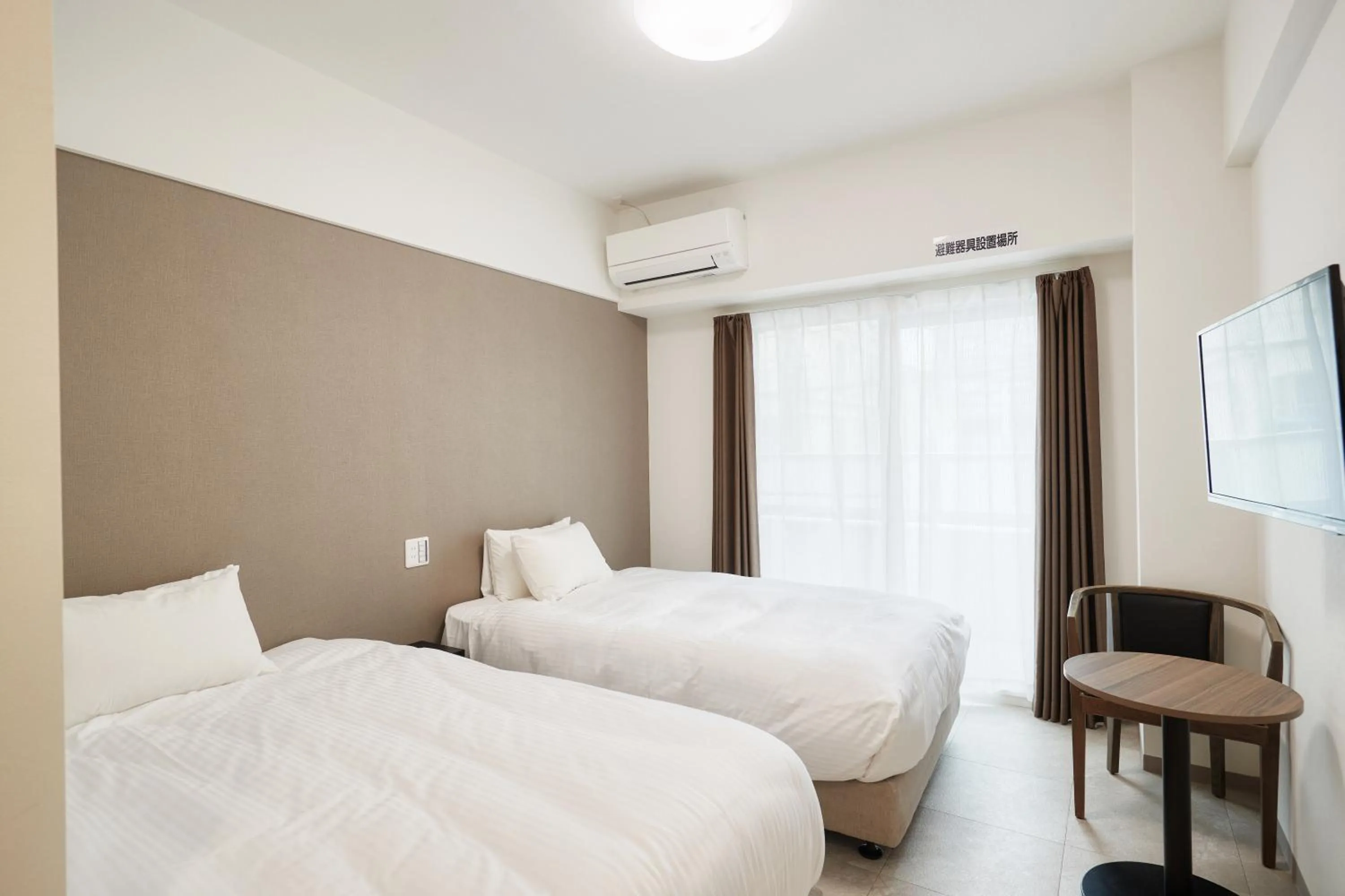 Photo of the whole room, Bed in BiBi Hotel Naminoue