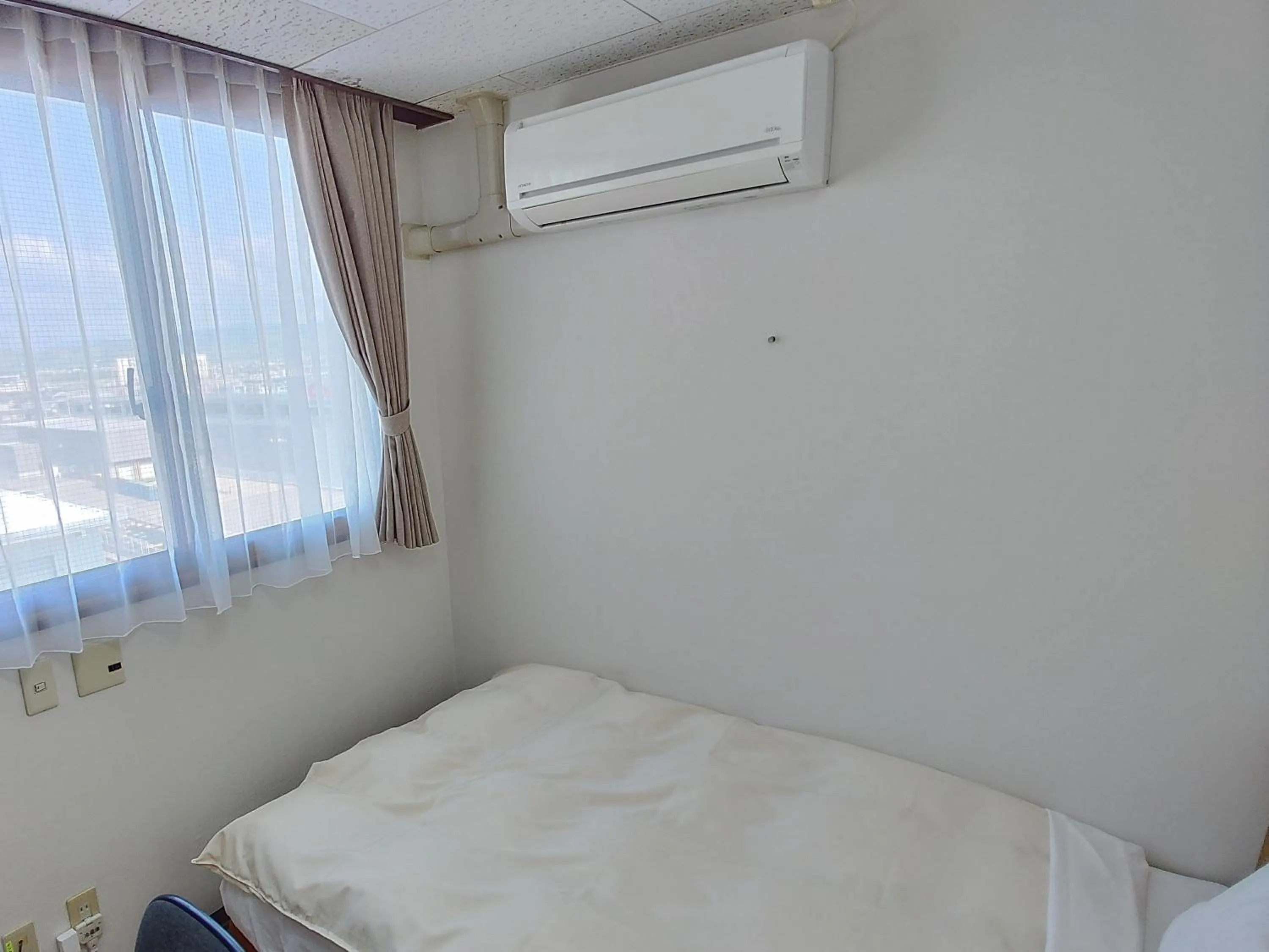 Bed in Hotel Hakusan Hills