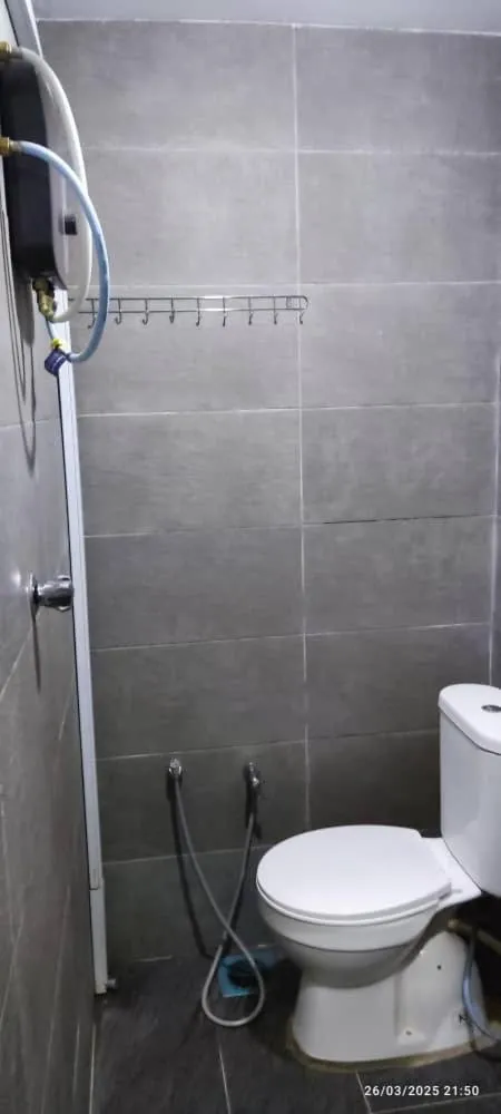 Toilet in Hotel Oasis