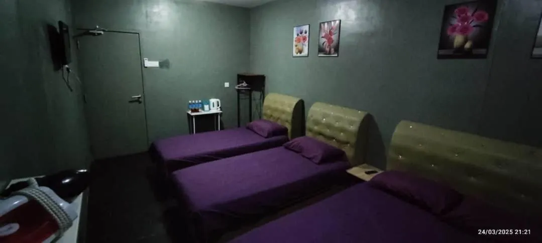Bed in Hotel Oasis