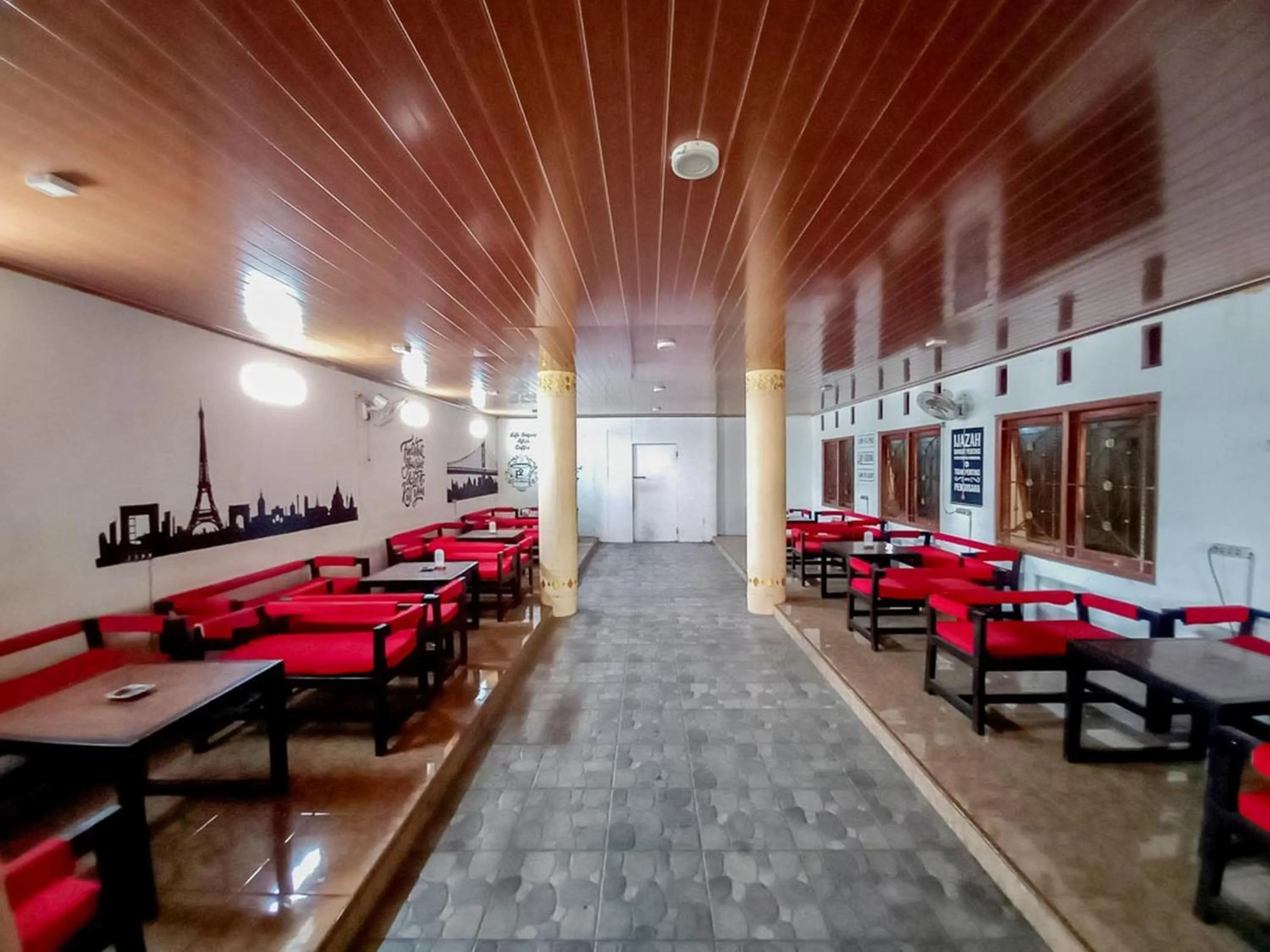 Living room in Papilo House near Stasiun Nganjuk Mitra RedDoorz