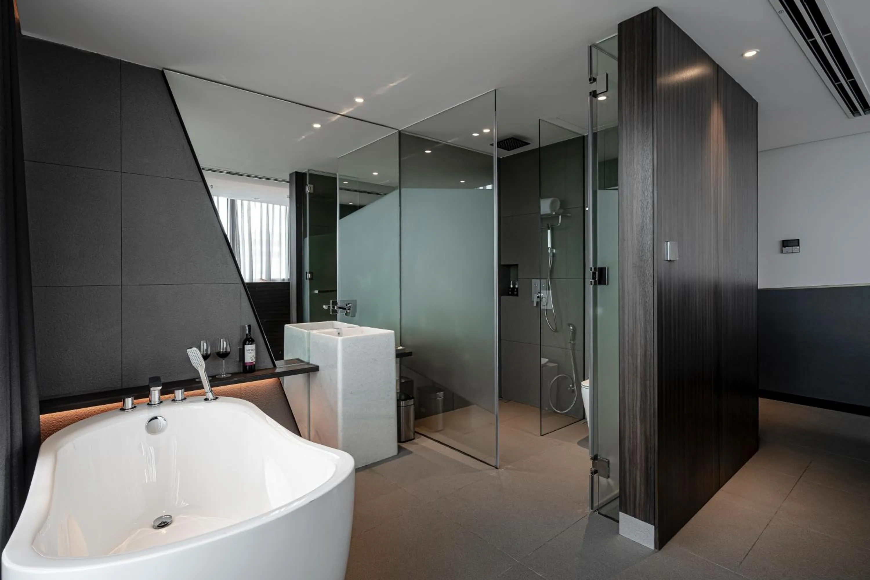 Bathroom in Draco Hotel & Suites