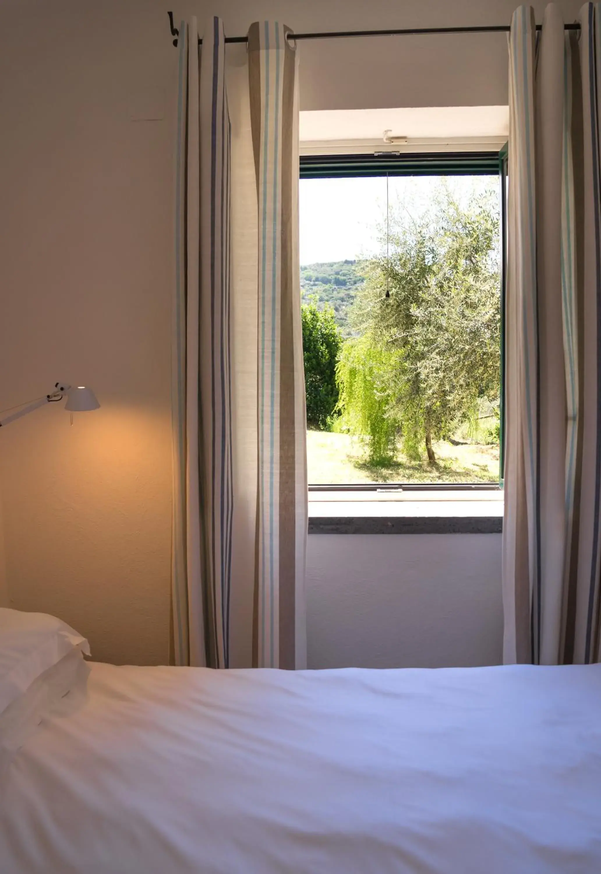 Garden view, Bed in Relais Regina Giovanna Garden view, Bed in Relais Regina Giovanna
