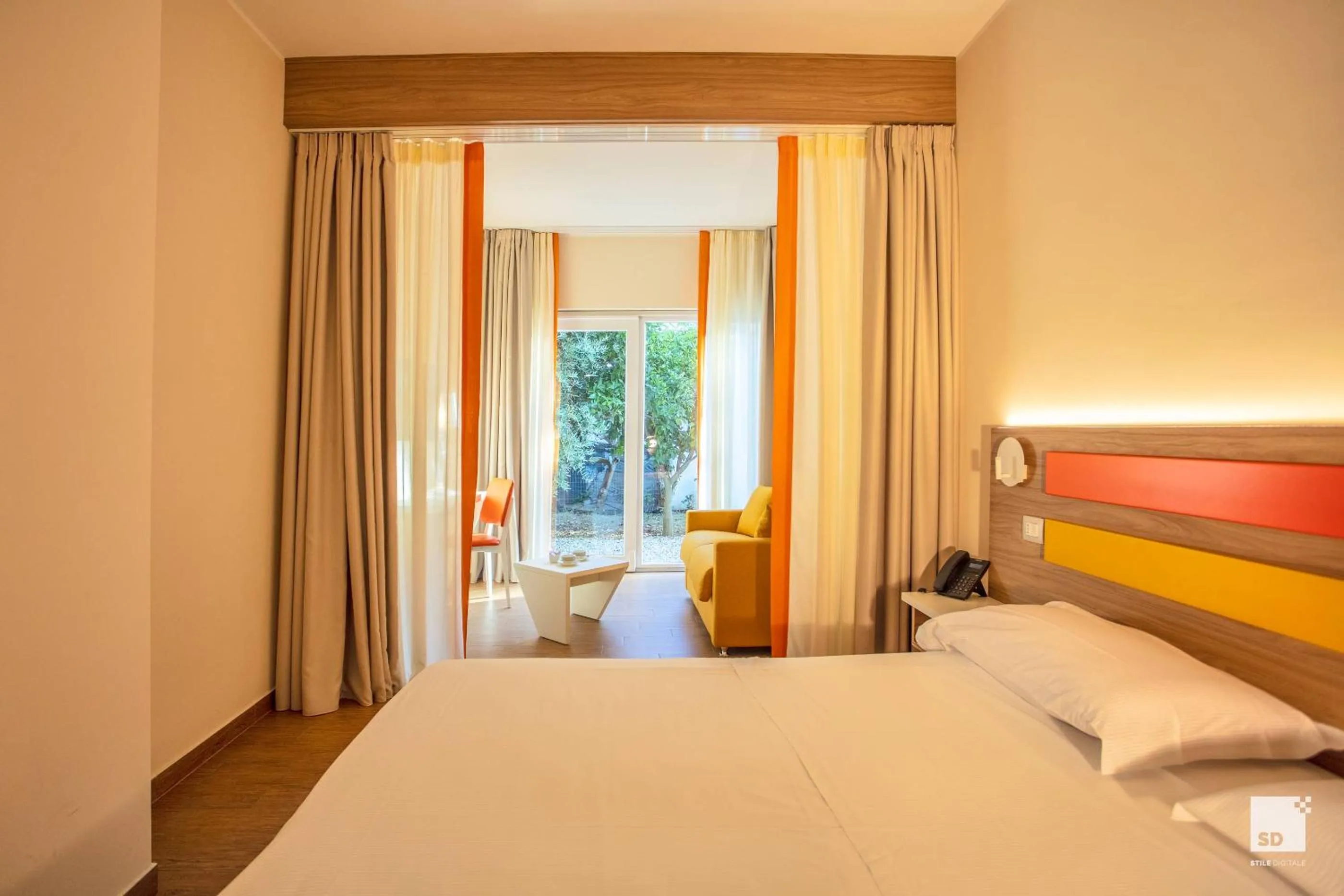 Bed in Tonicello Hotel Resort & SPA