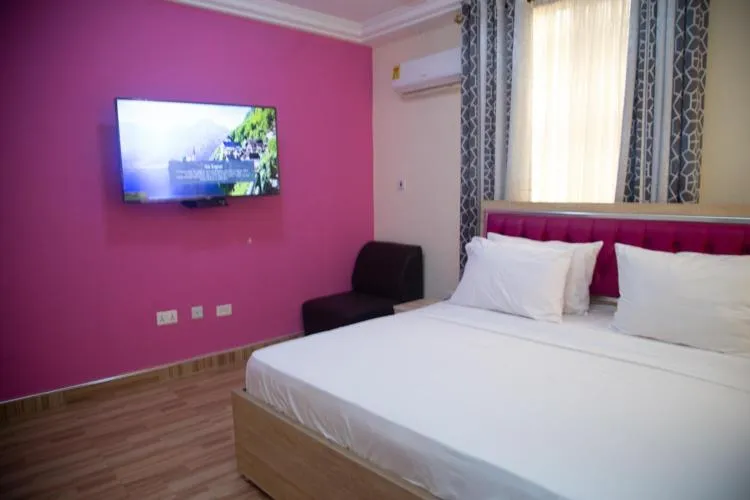 Bed in Macoba Luxury Apartments