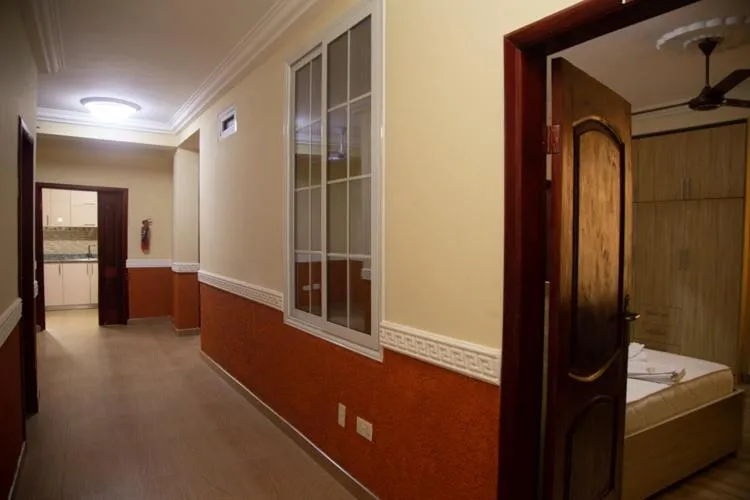 Bed in Macoba Luxury Apartments