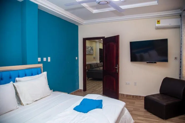 TV and multimedia, Bed in Macoba Luxury Apartments