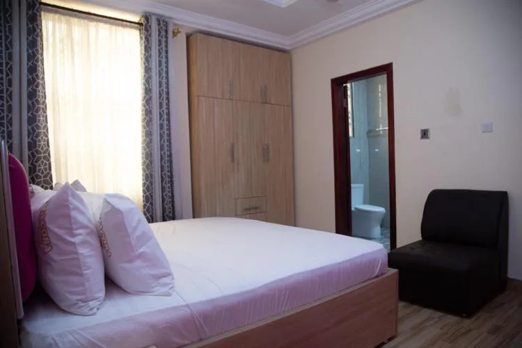 Bed in Macoba Luxury Apartments