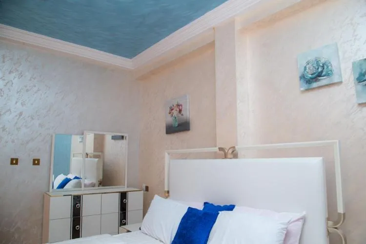 Bed in Macoba Luxury Apartments