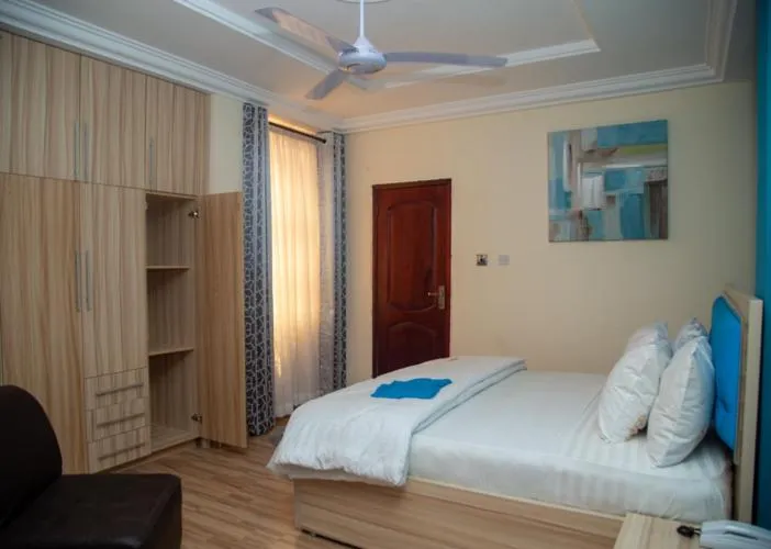 Bed in Macoba Luxury Apartments