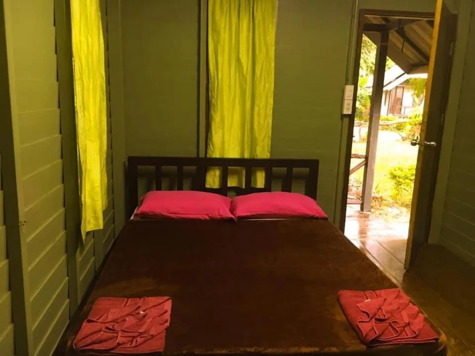 Bed in Green Garden Bungalows