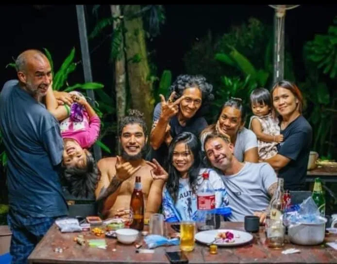 People in Green Garden Bungalows