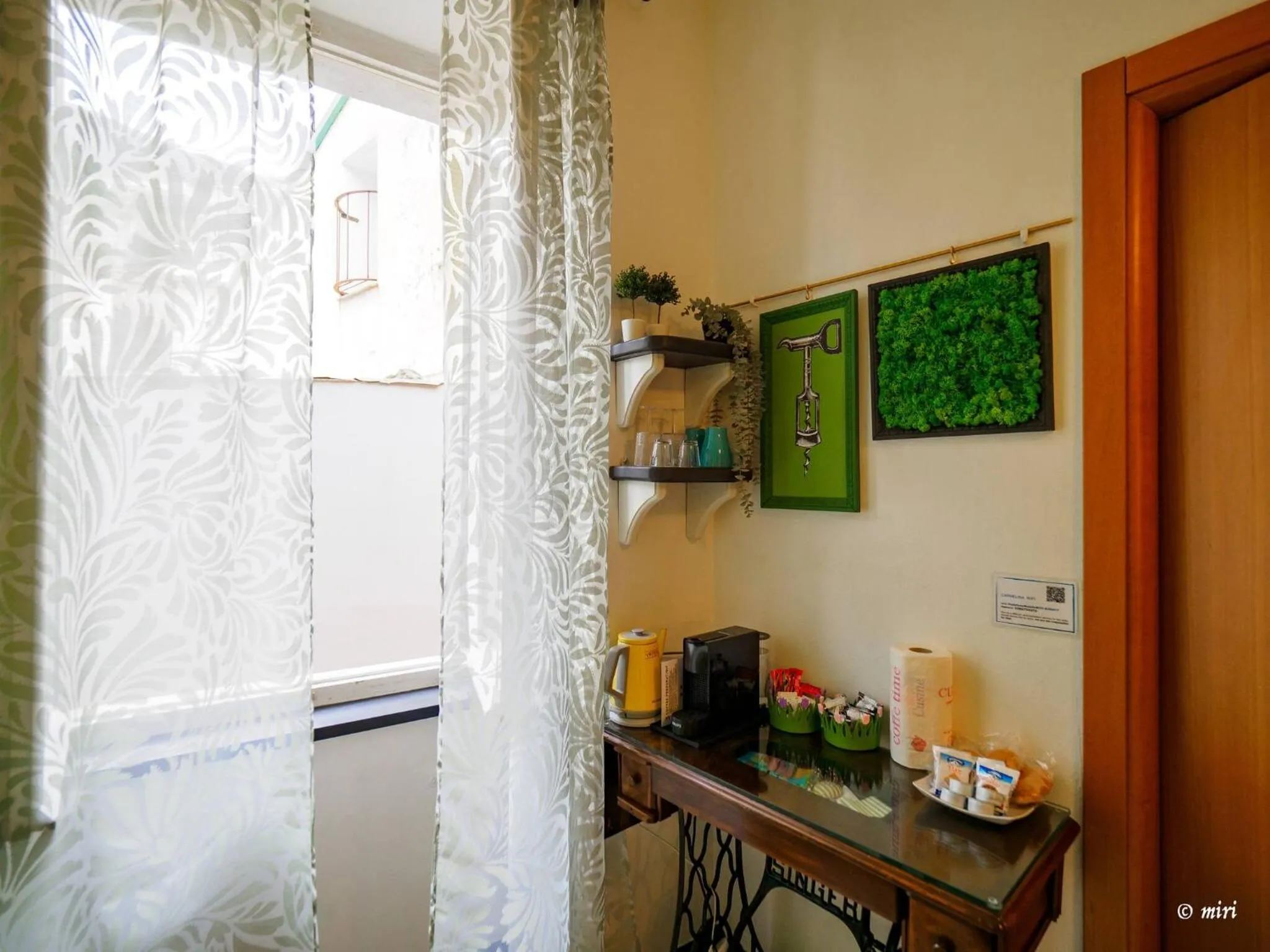 Bed in Carmelina Tiny Village Room