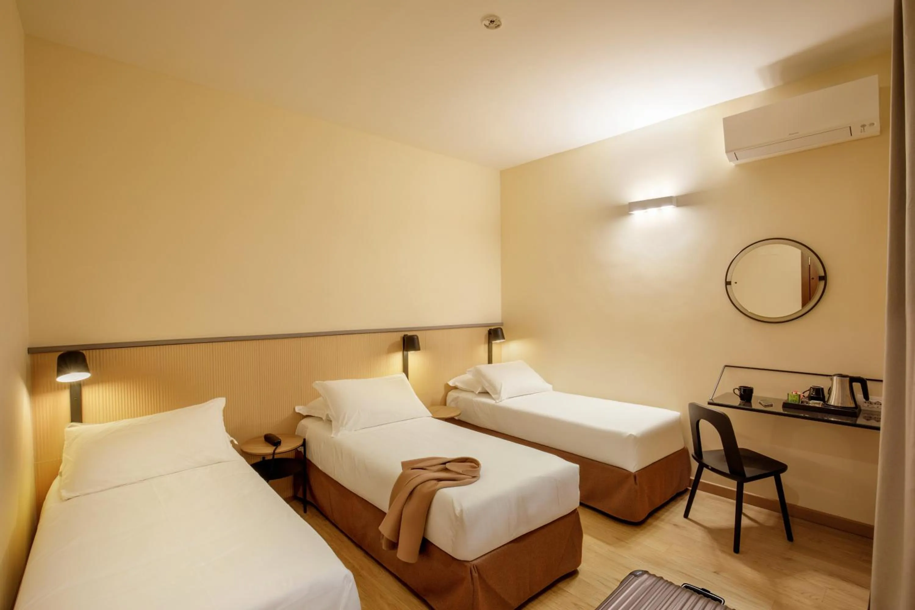 Bed in Hotel Colosseum