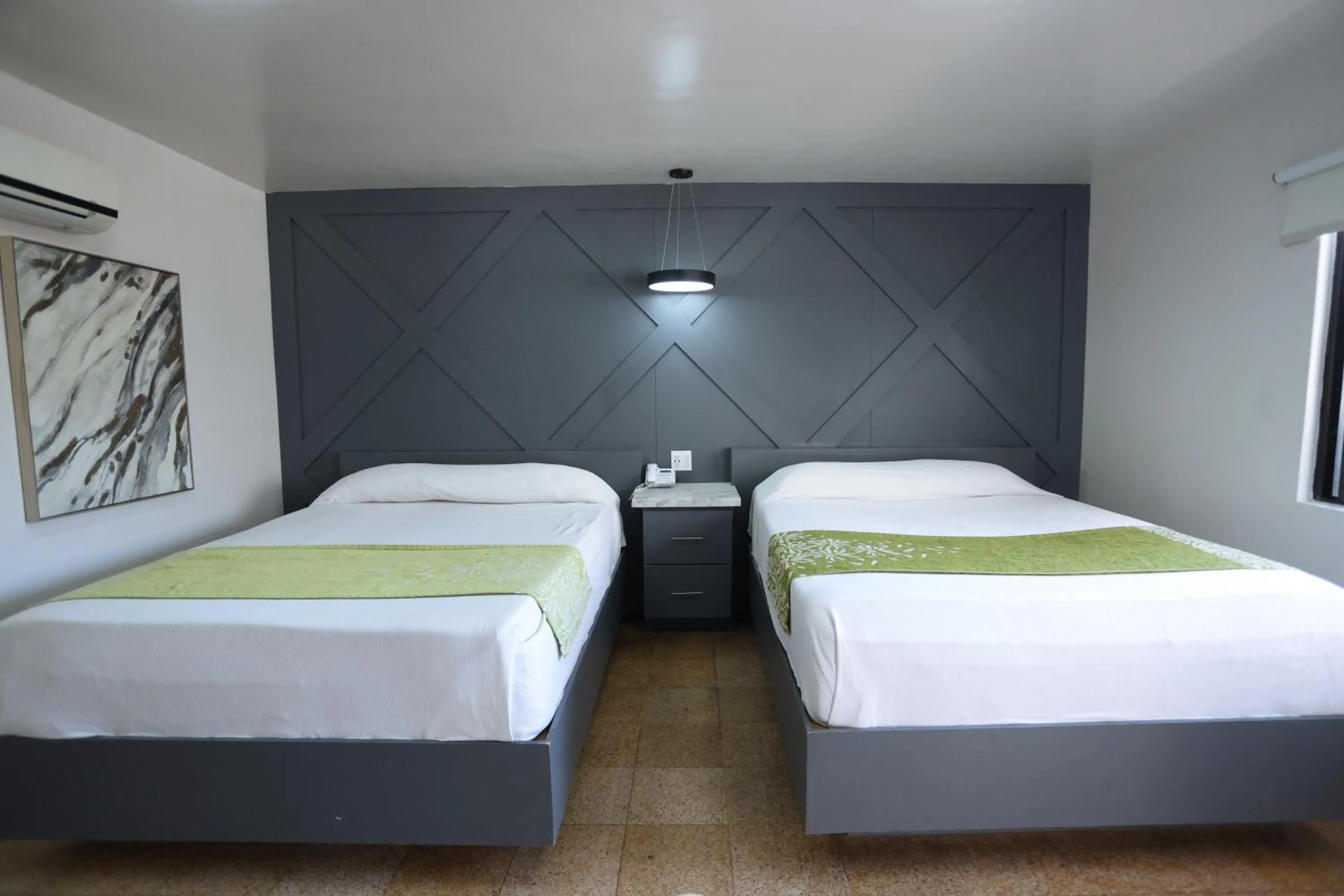 Bed in Hotel Aqua Rio