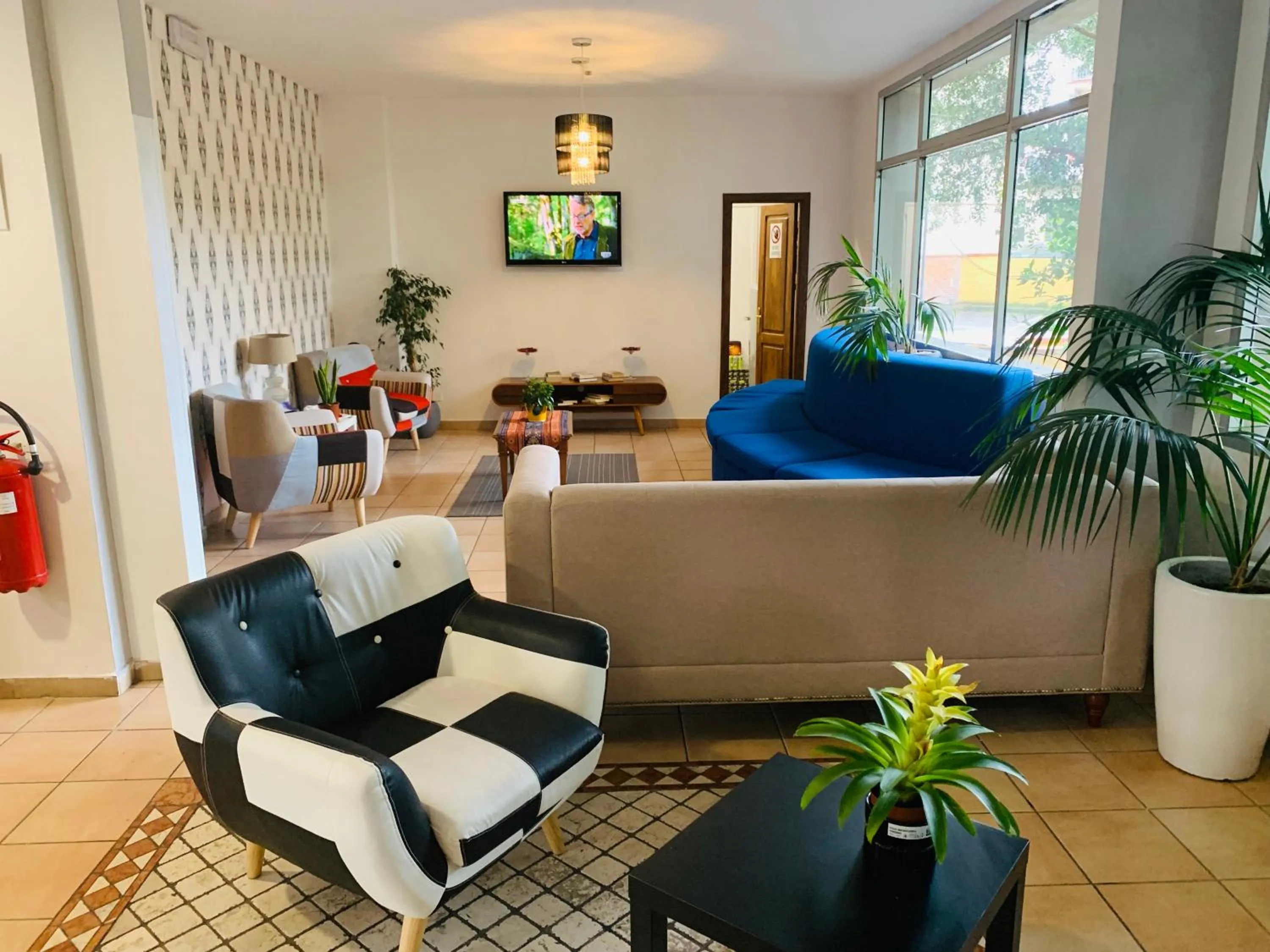 Communal lounge/ TV room in Hotel Real