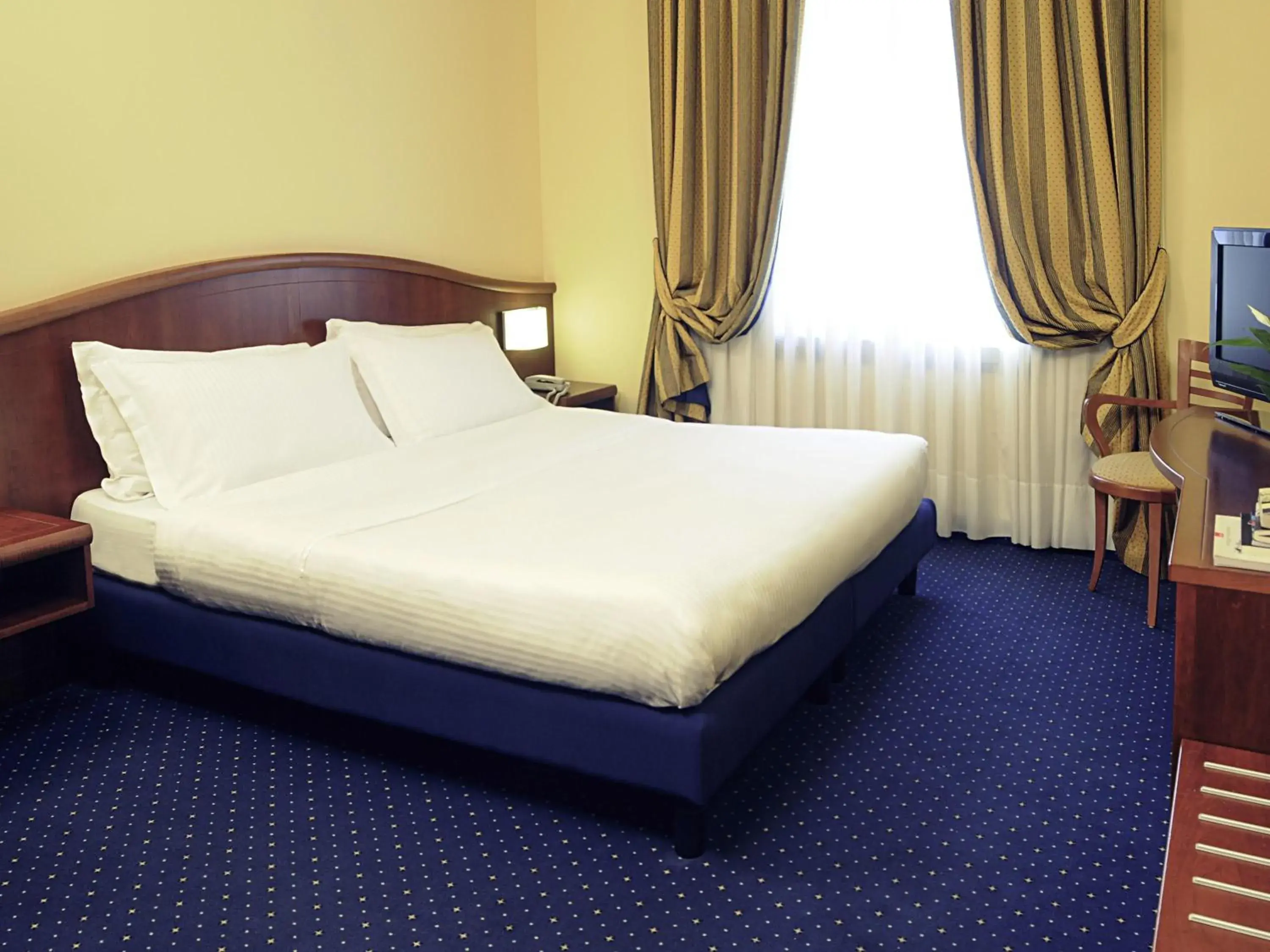 Bedroom, Bed in Mercure Genova San Biagio Bedroom, Bed in Mercure Genova San Biagio