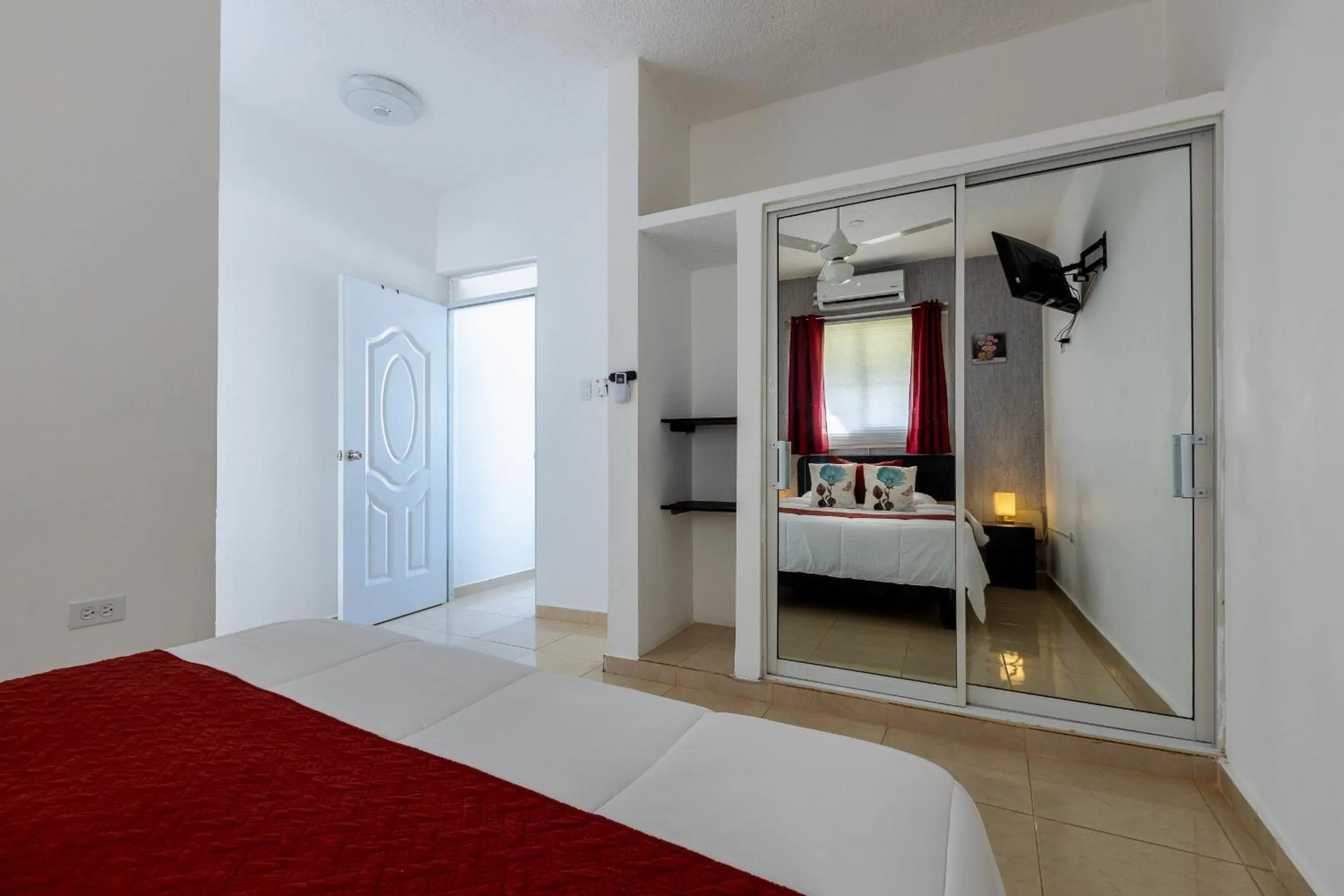 Bed in EDMA APARTAHOTEL