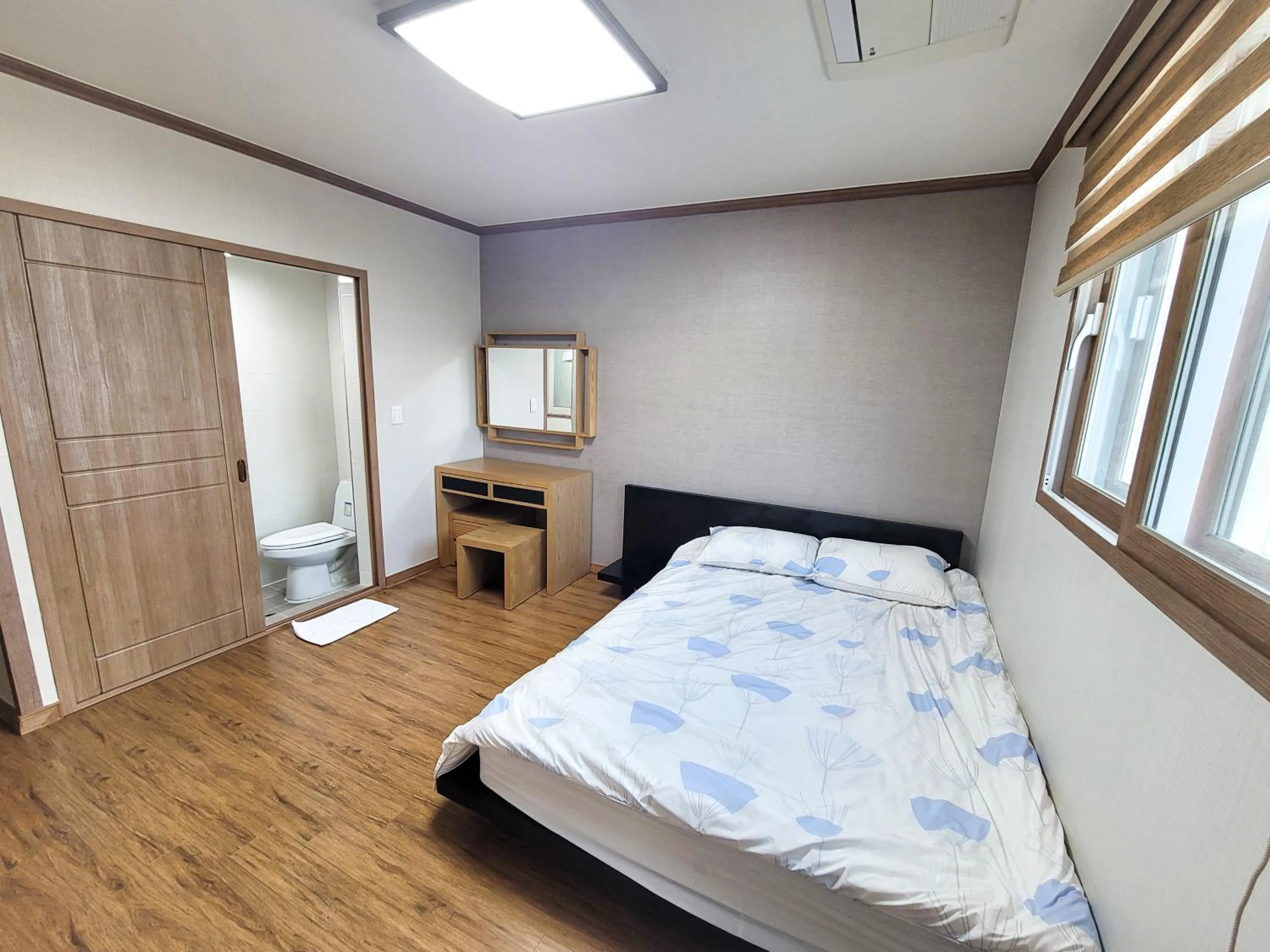 Bed in Sancheong Korean Medicine Family Hotel