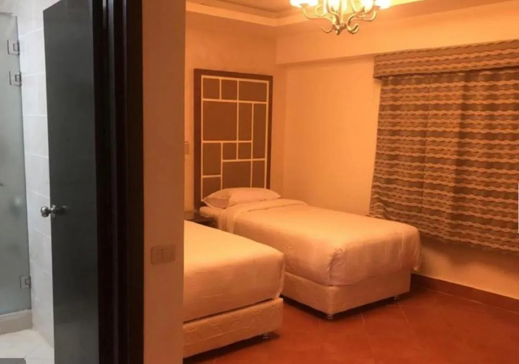 Bed in Amazing sea view Penthouse Apartment in Pyramids Porto El-Sokhna