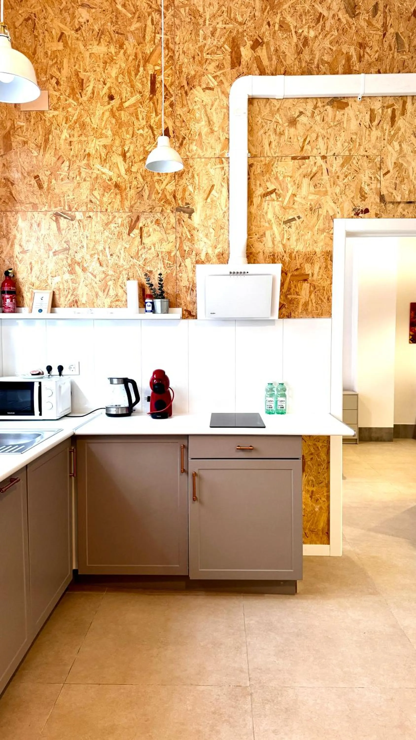 Kitchen or kitchenette in Soho Boho Apartments - with sunny rooftop terrace and fiber optic internet