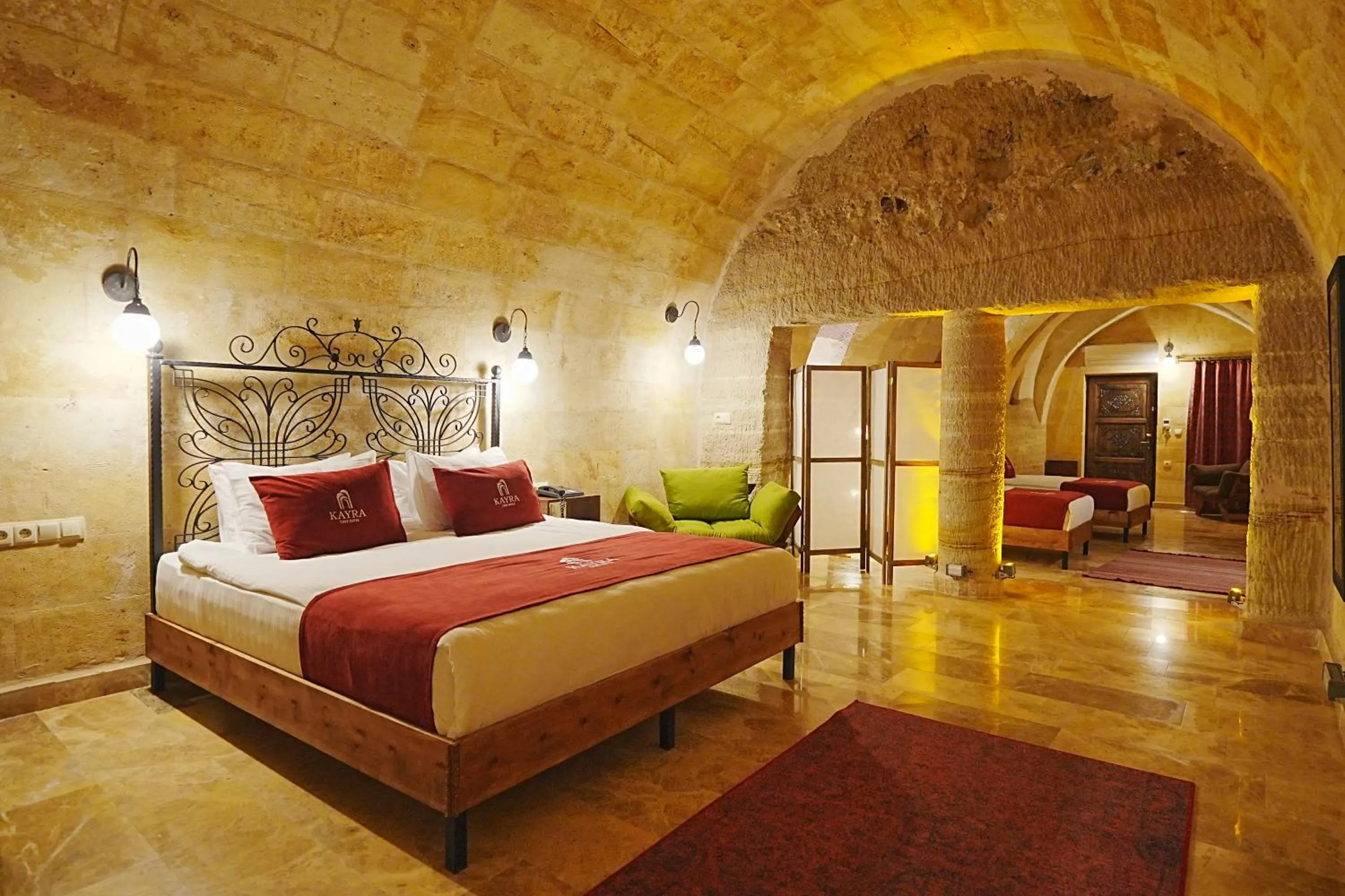 Bed in Kayra Cave Suites