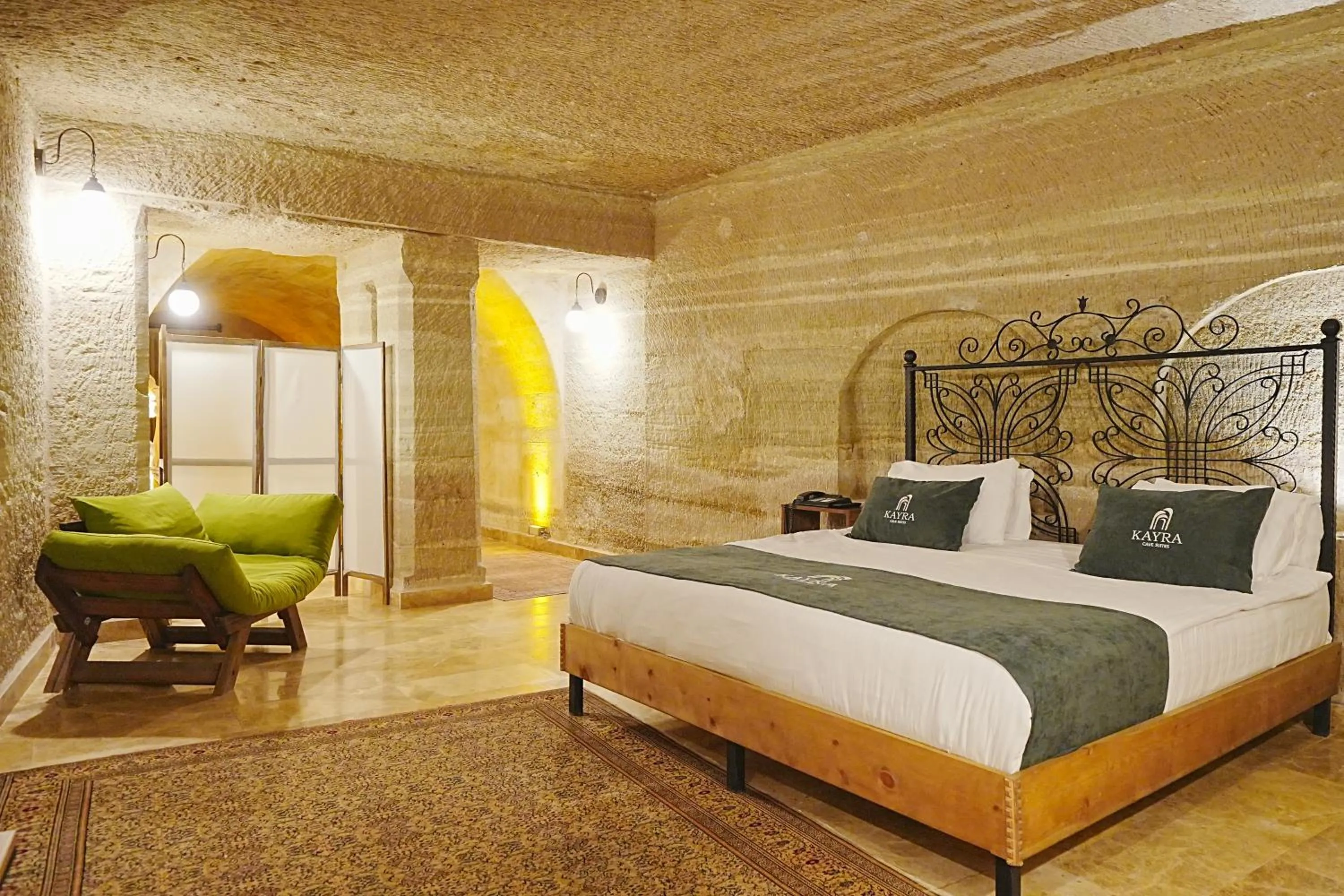 Bed in Kayra Cave Suites