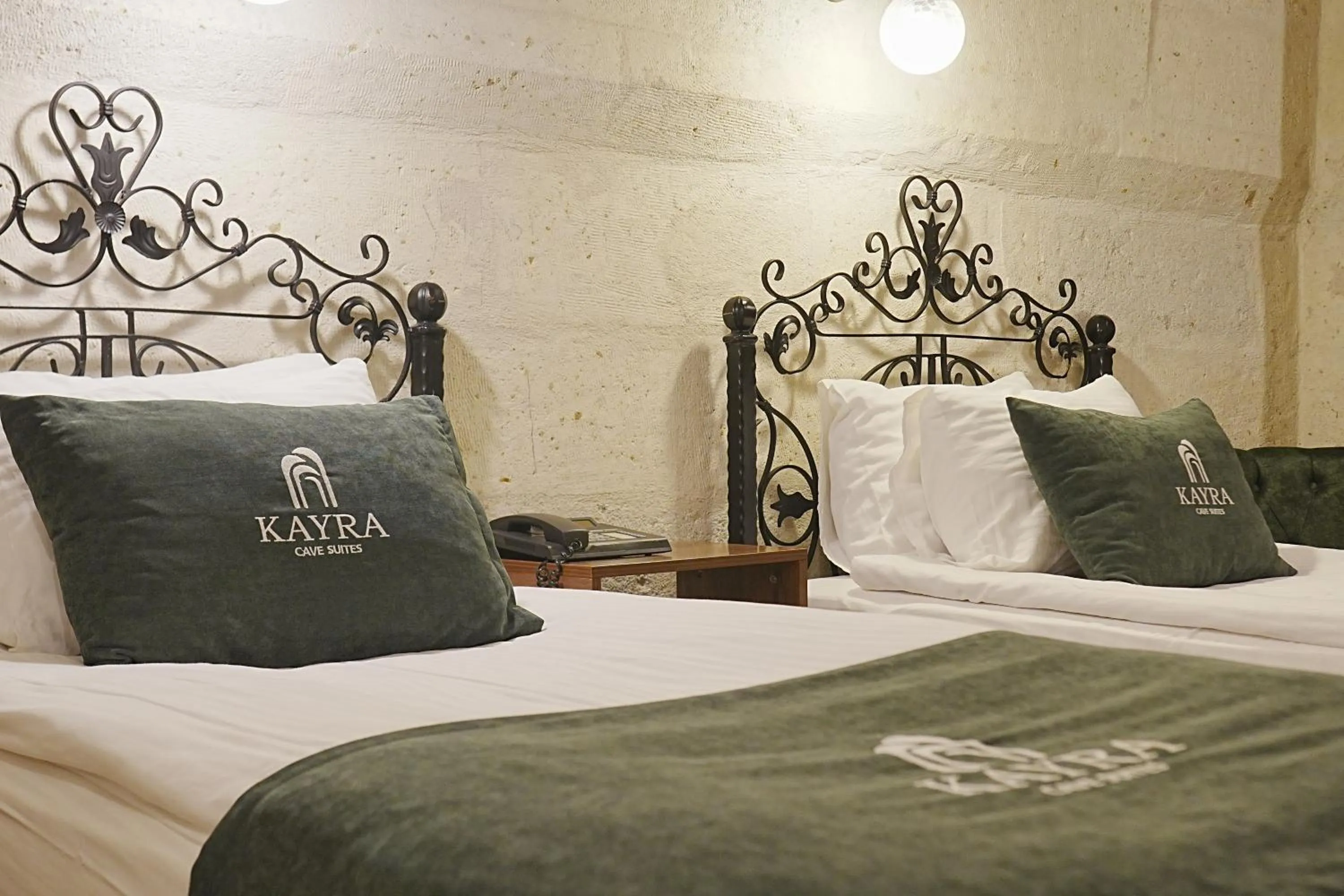 Bed in Kayra Cave Suites