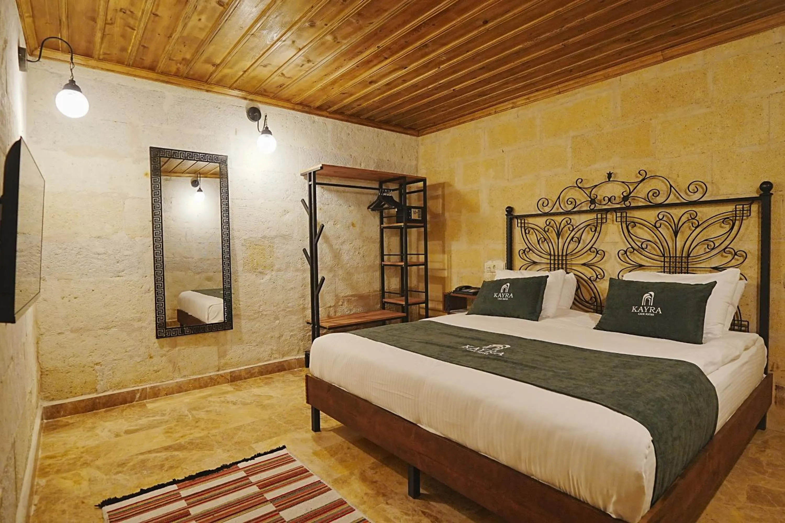 Bed in Kayra Cave Suites