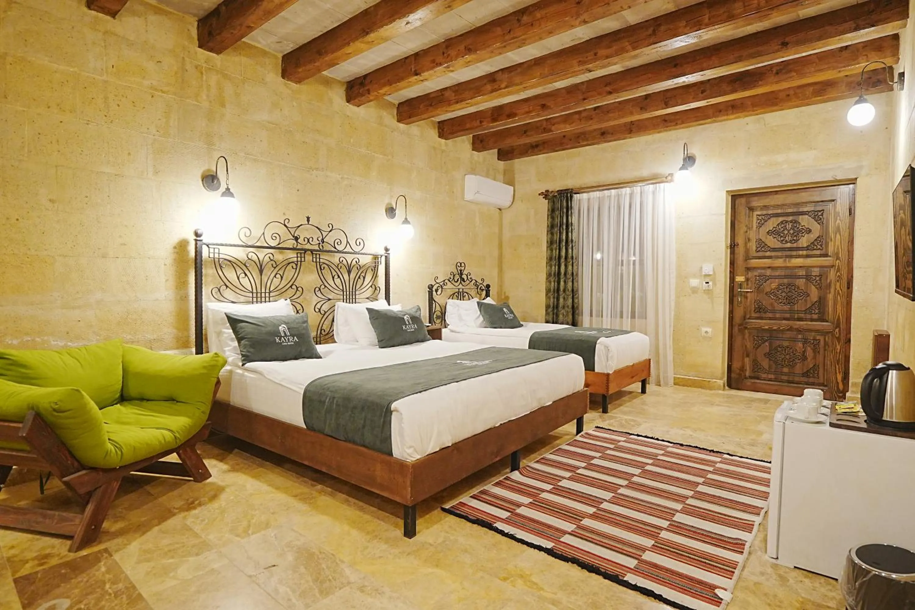 Bed in Kayra Cave Suites