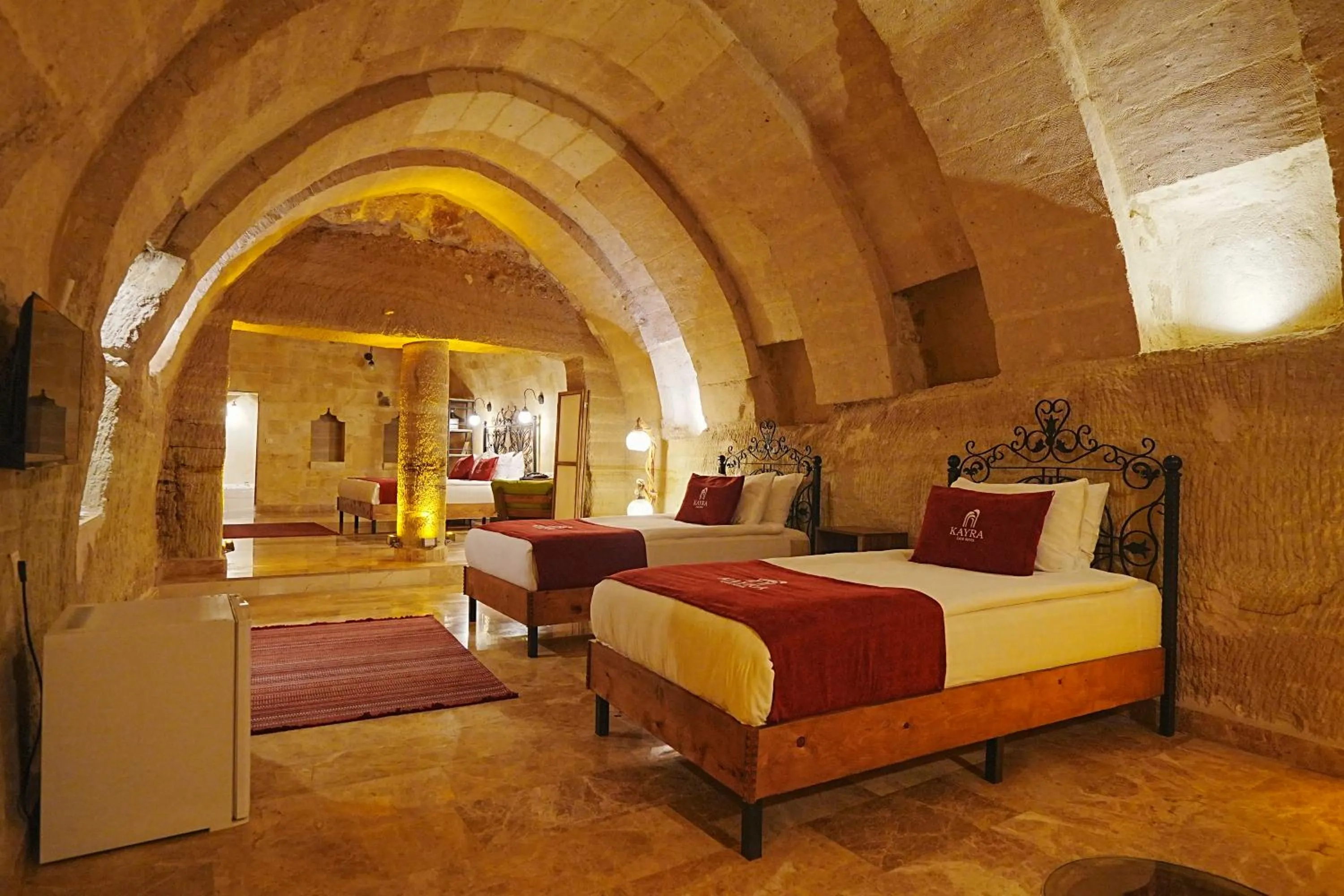 Bed in Kayra Cave Suites