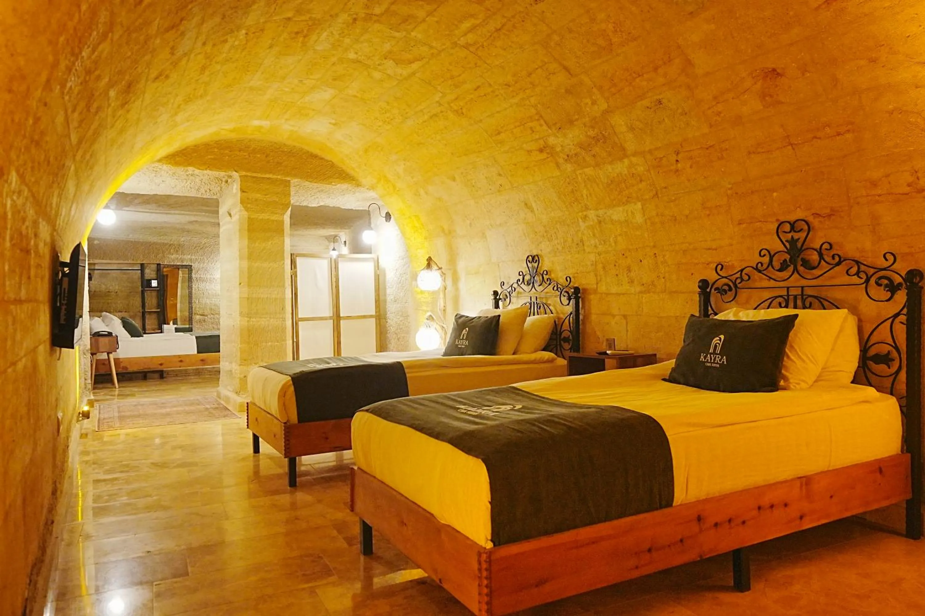 Bed in Kayra Cave Suites