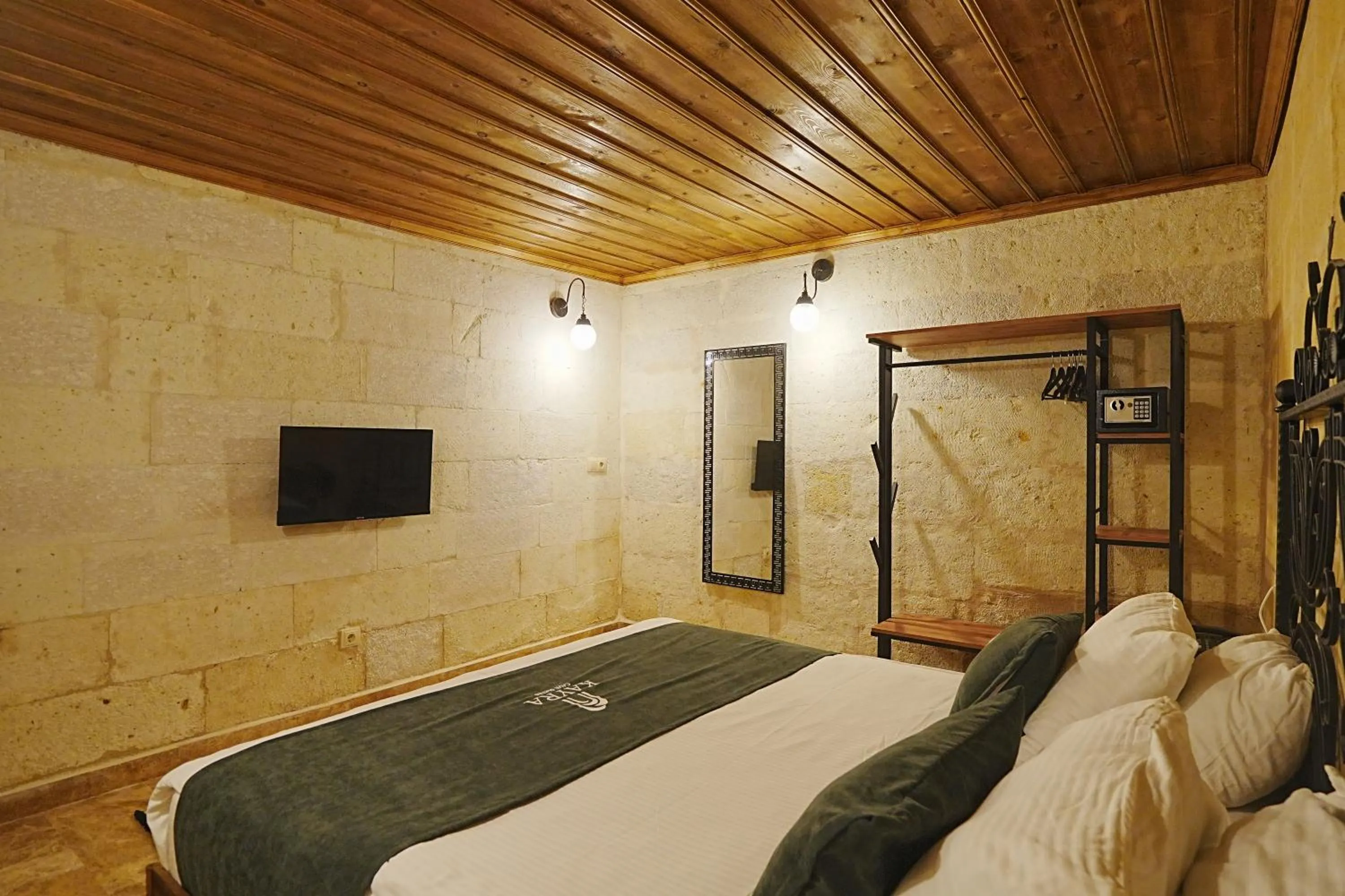 Bed in Kayra Cave Suites