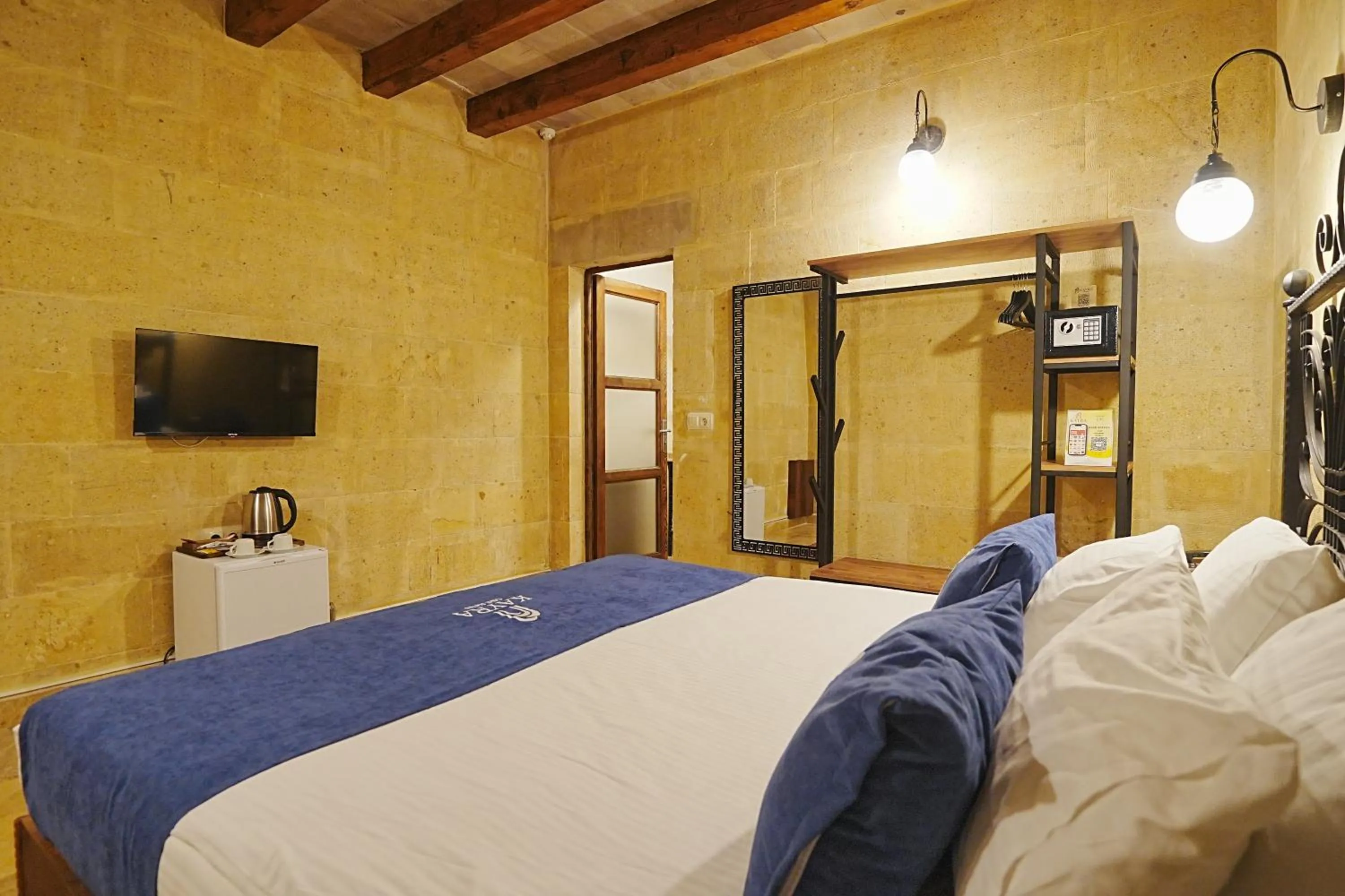 Bed in Kayra Cave Suites