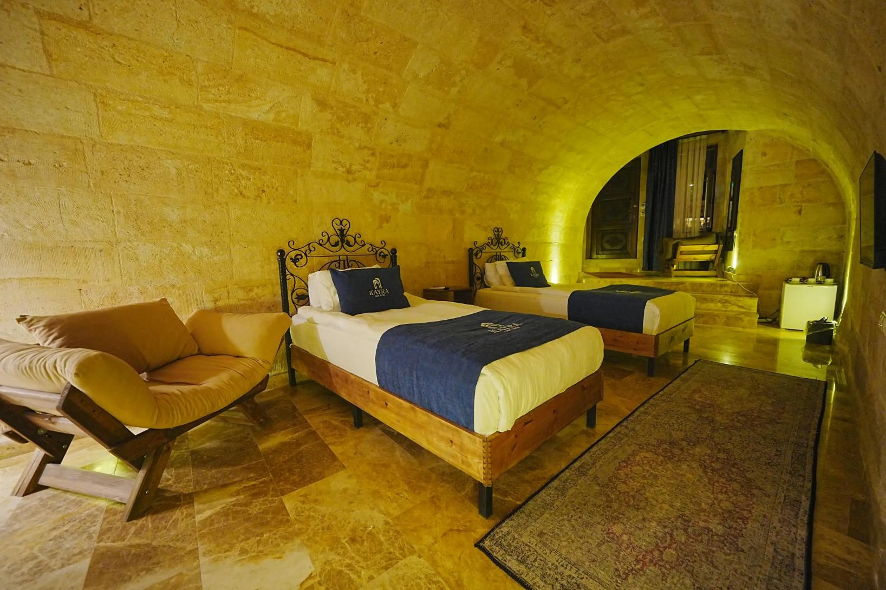 Bed in Kayra Cave Suites