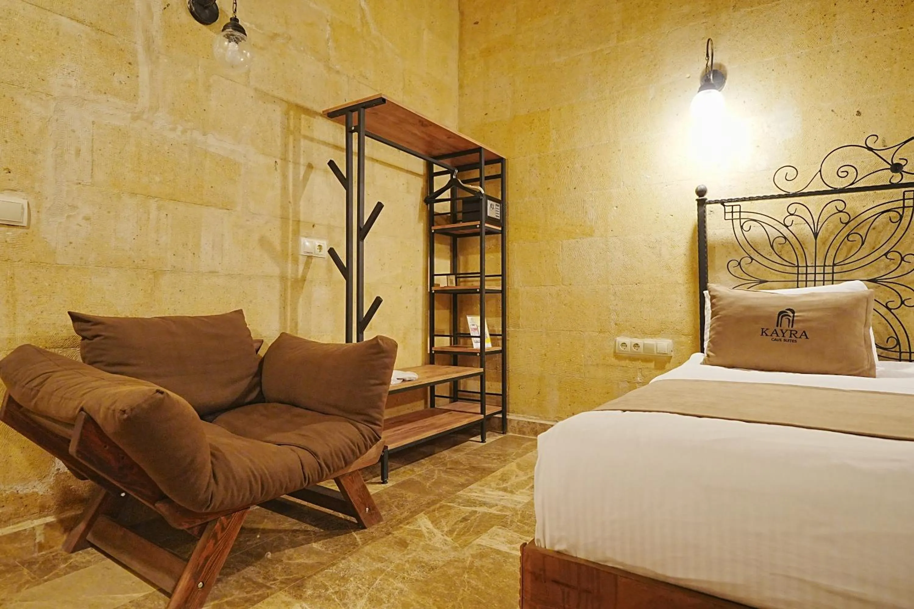 Bed in Kayra Cave Suites