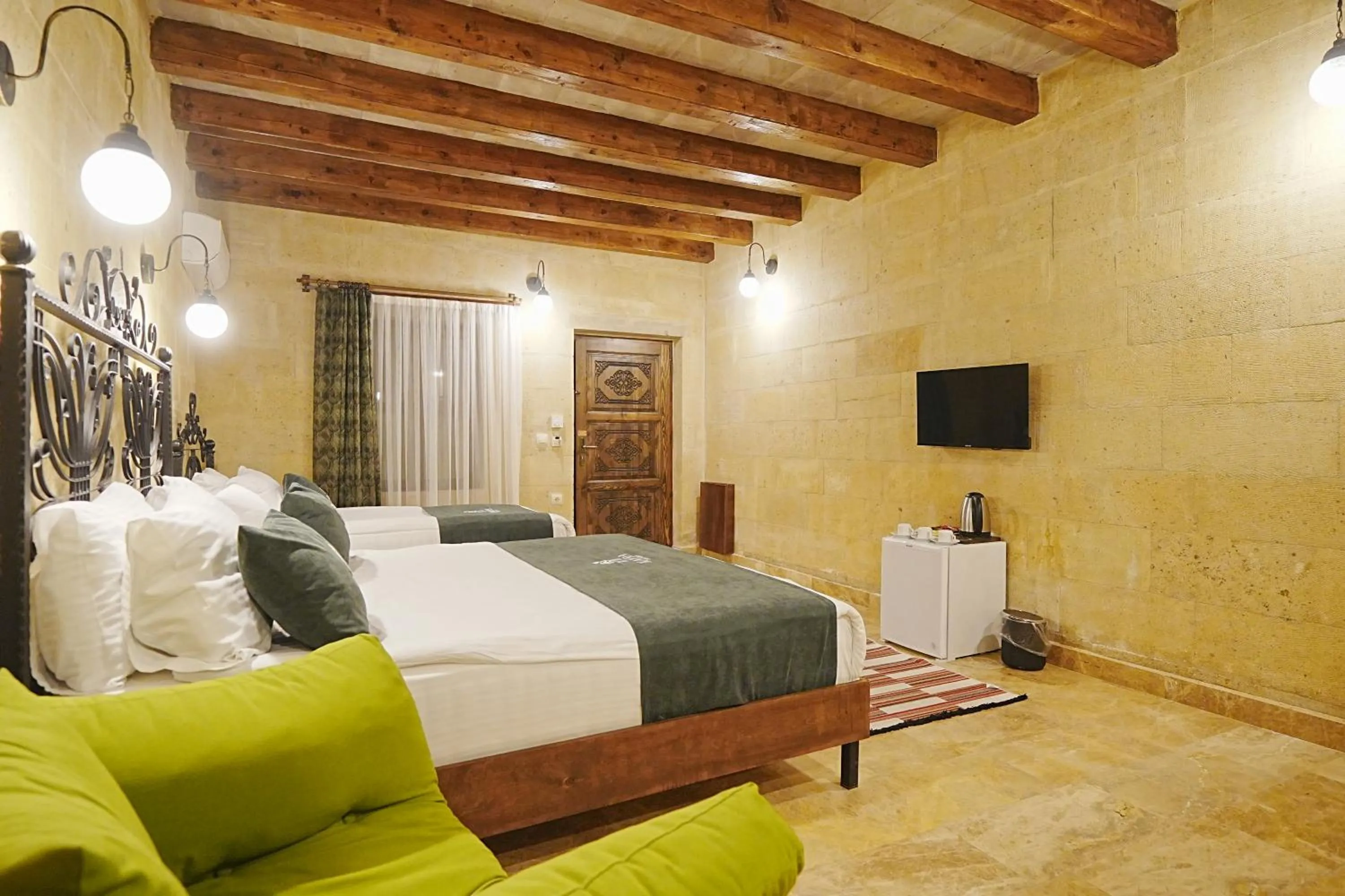 Bed in Kayra Cave Suites