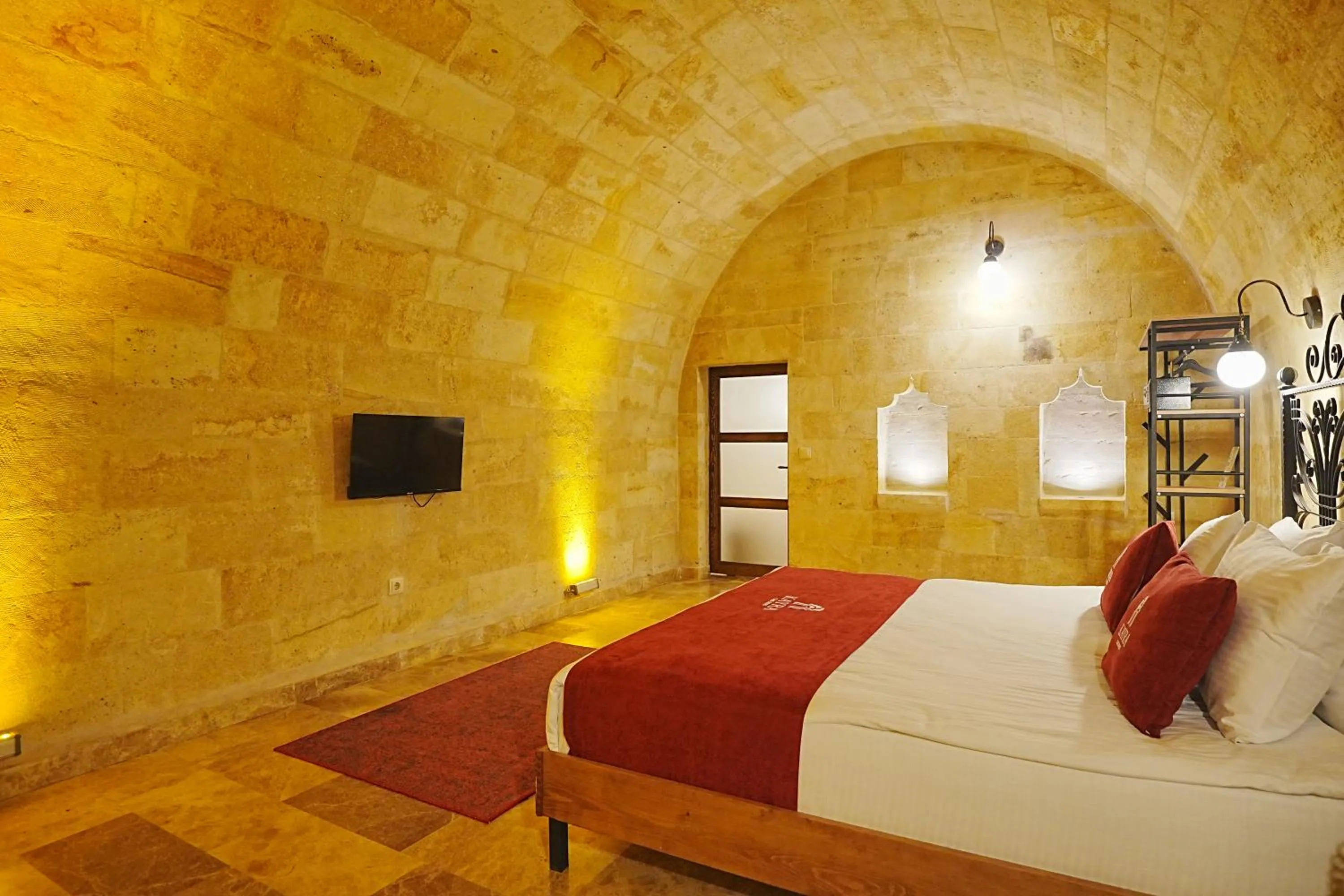 Bed in Kayra Cave Suites