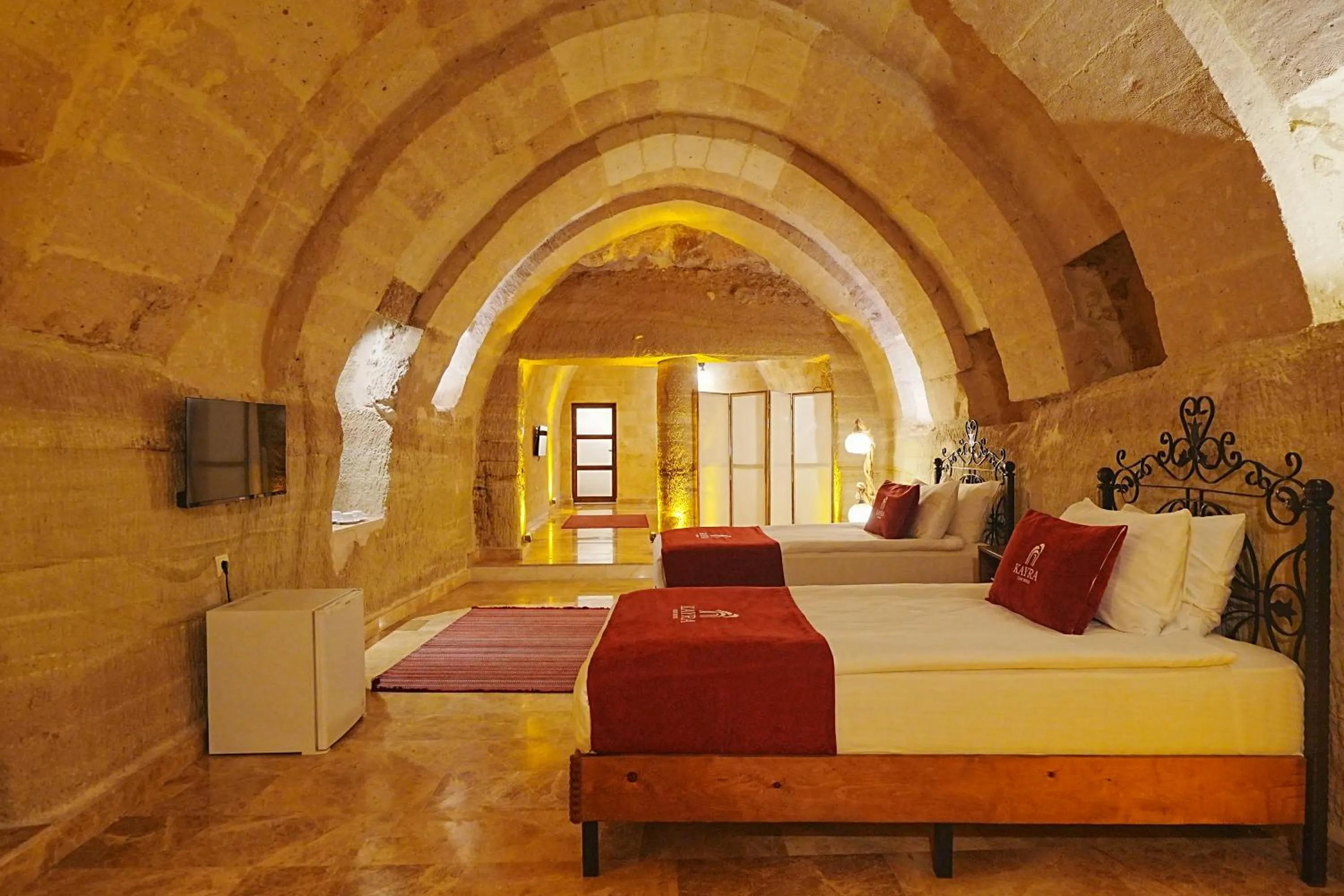 Bed in Kayra Cave Suites